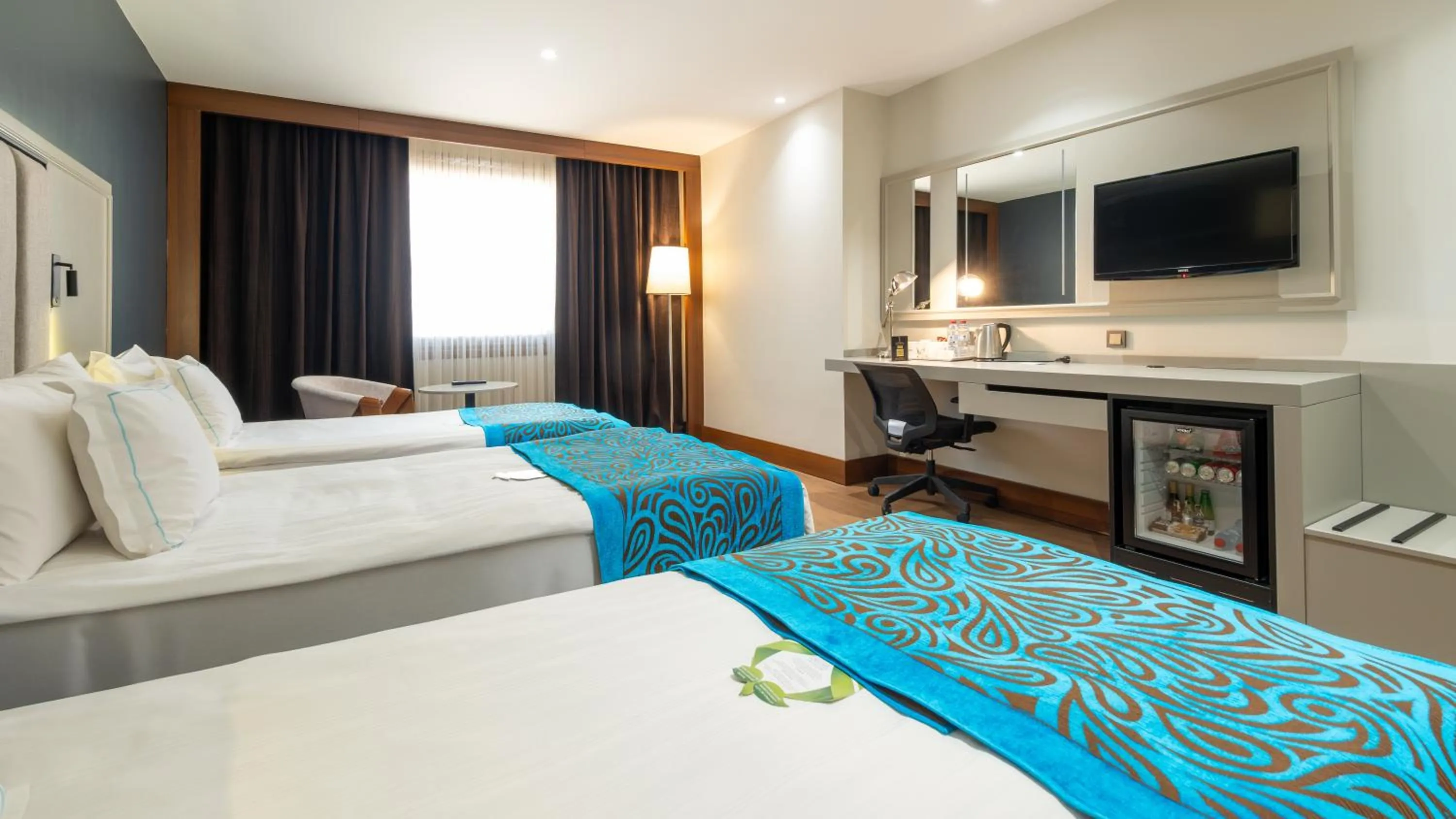 Bed in Teymur Continental Hotel