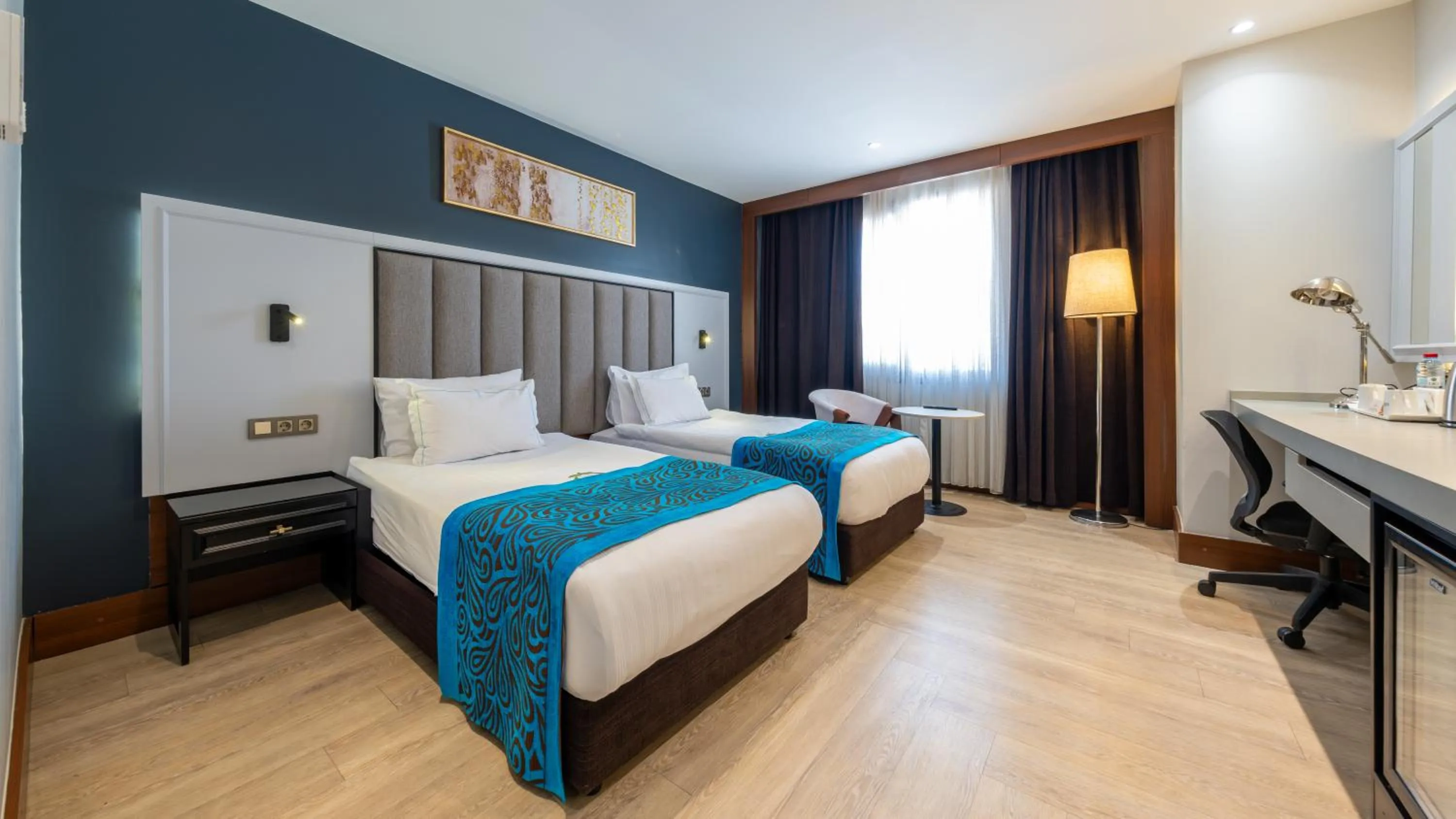 Bed in Teymur Continental Hotel