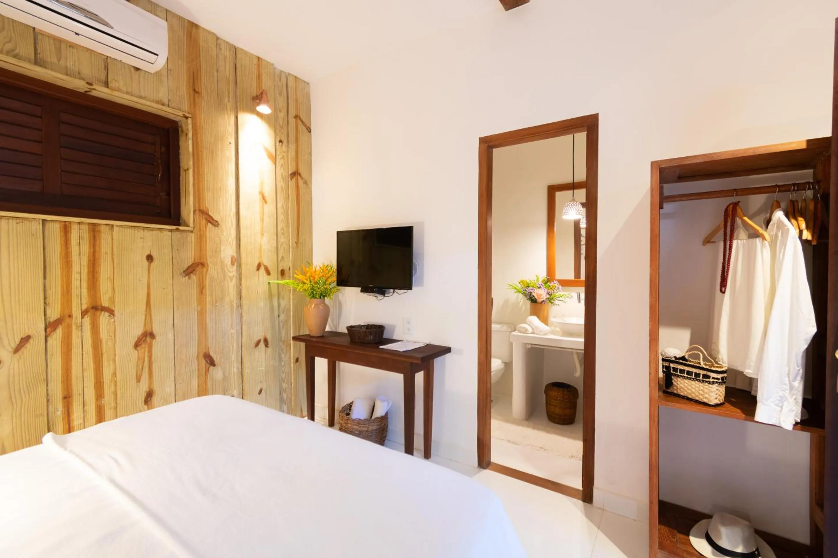 Bed in Pousada Jequitibá