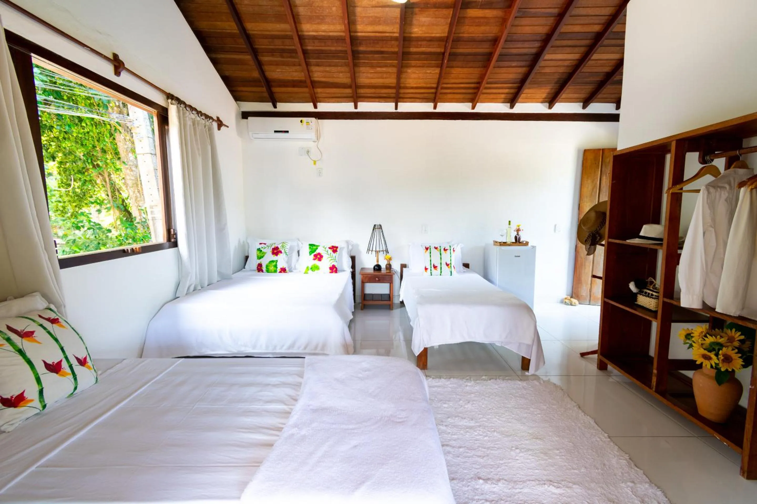 Bed in Pousada Jequitibá