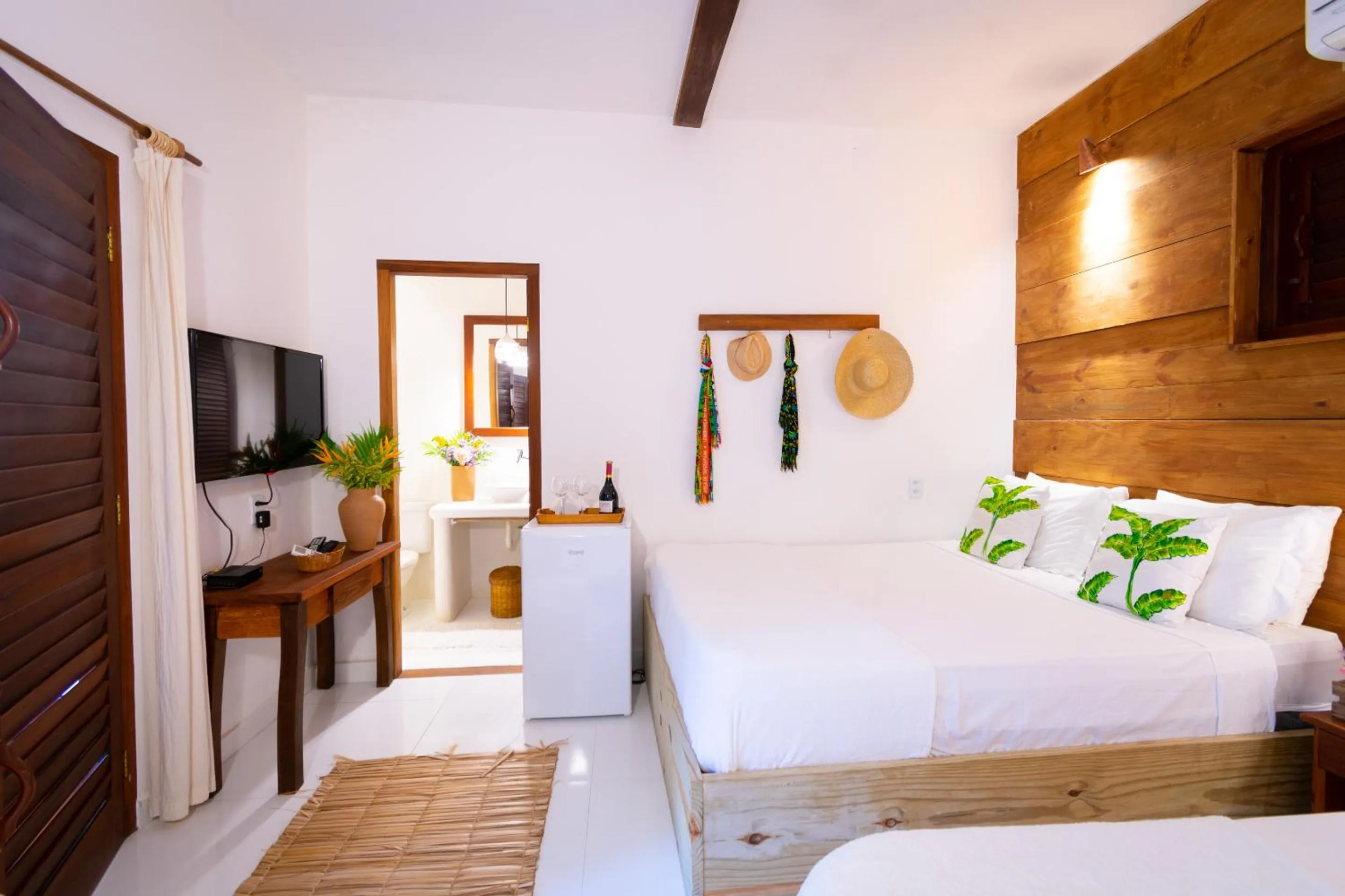 Bed in Pousada Jequitibá