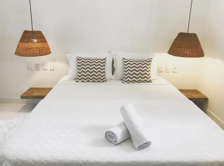 Bed in Pousada Jequitibá