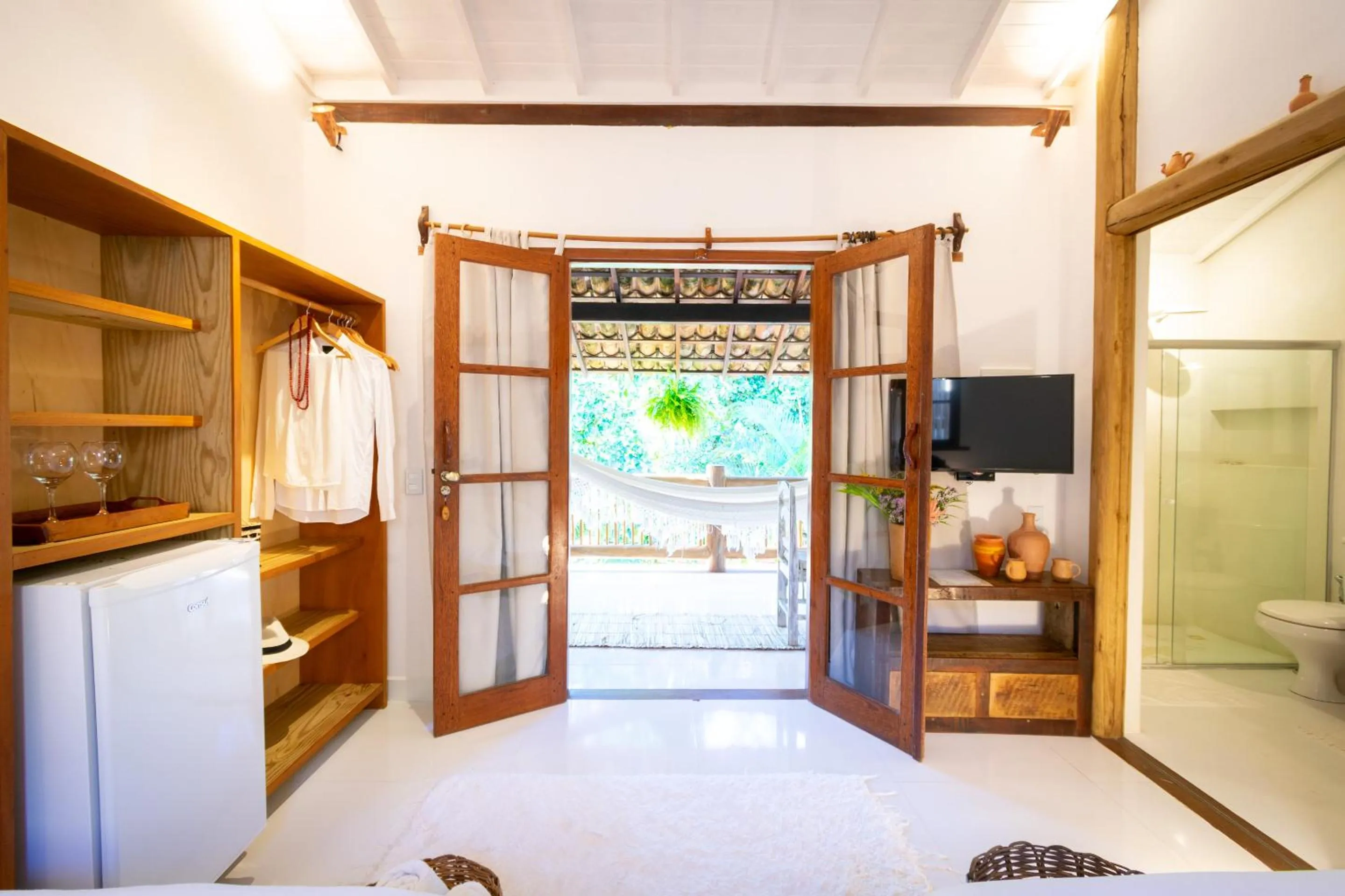 Bed in Pousada Jequitibá