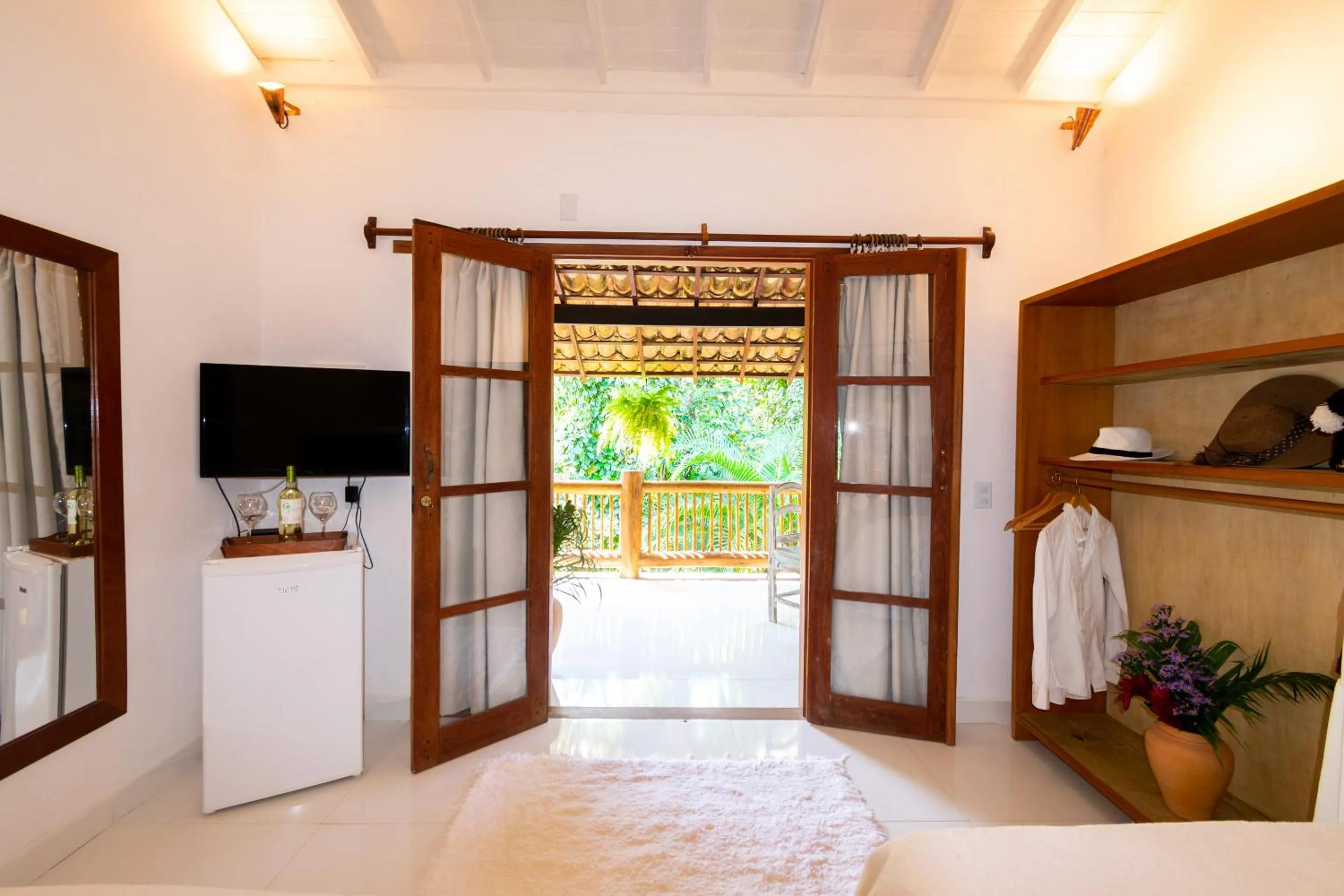 Bed in Pousada Jequitibá