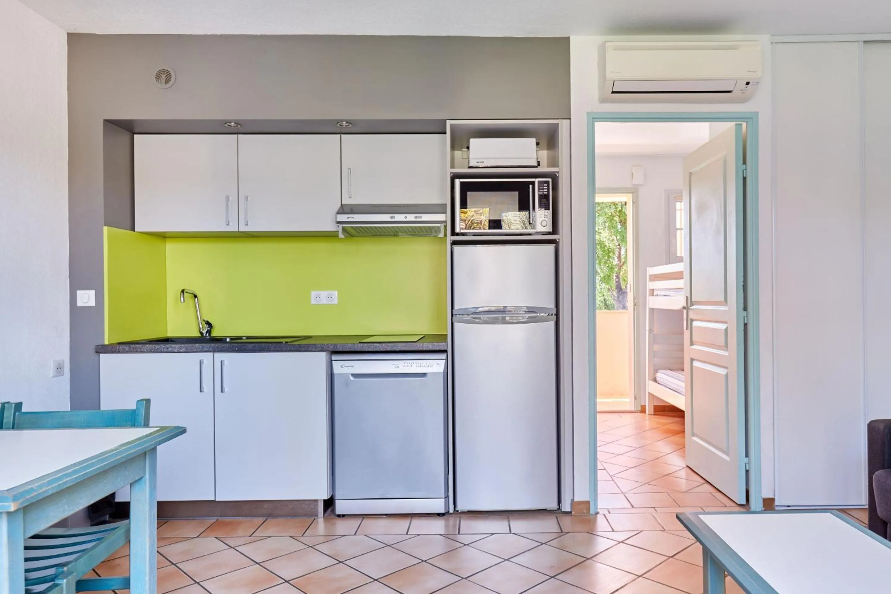 Kitchen or kitchenette in Résidence Odalys La Palmeraie