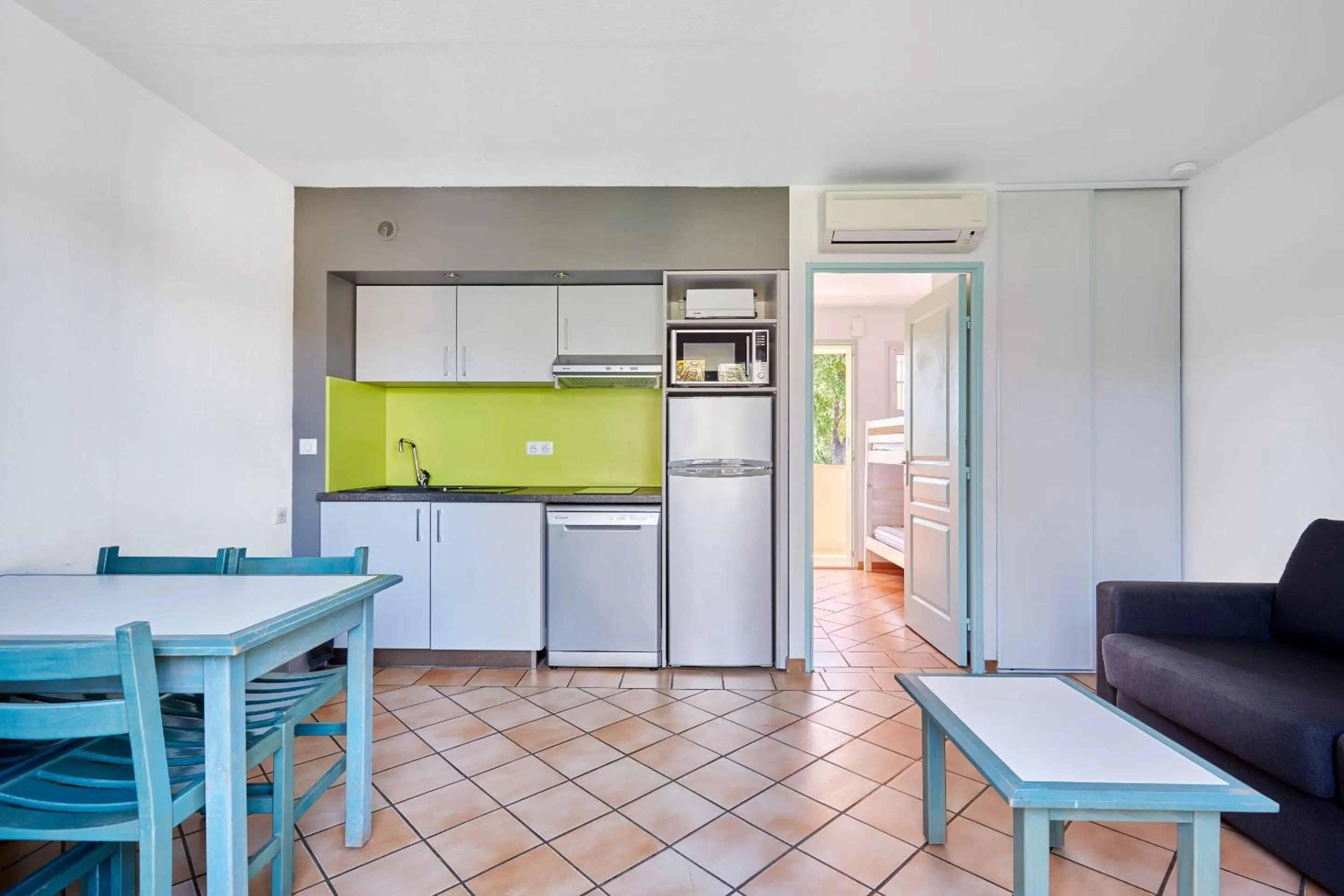 Kitchen or kitchenette in Résidence Odalys La Palmeraie