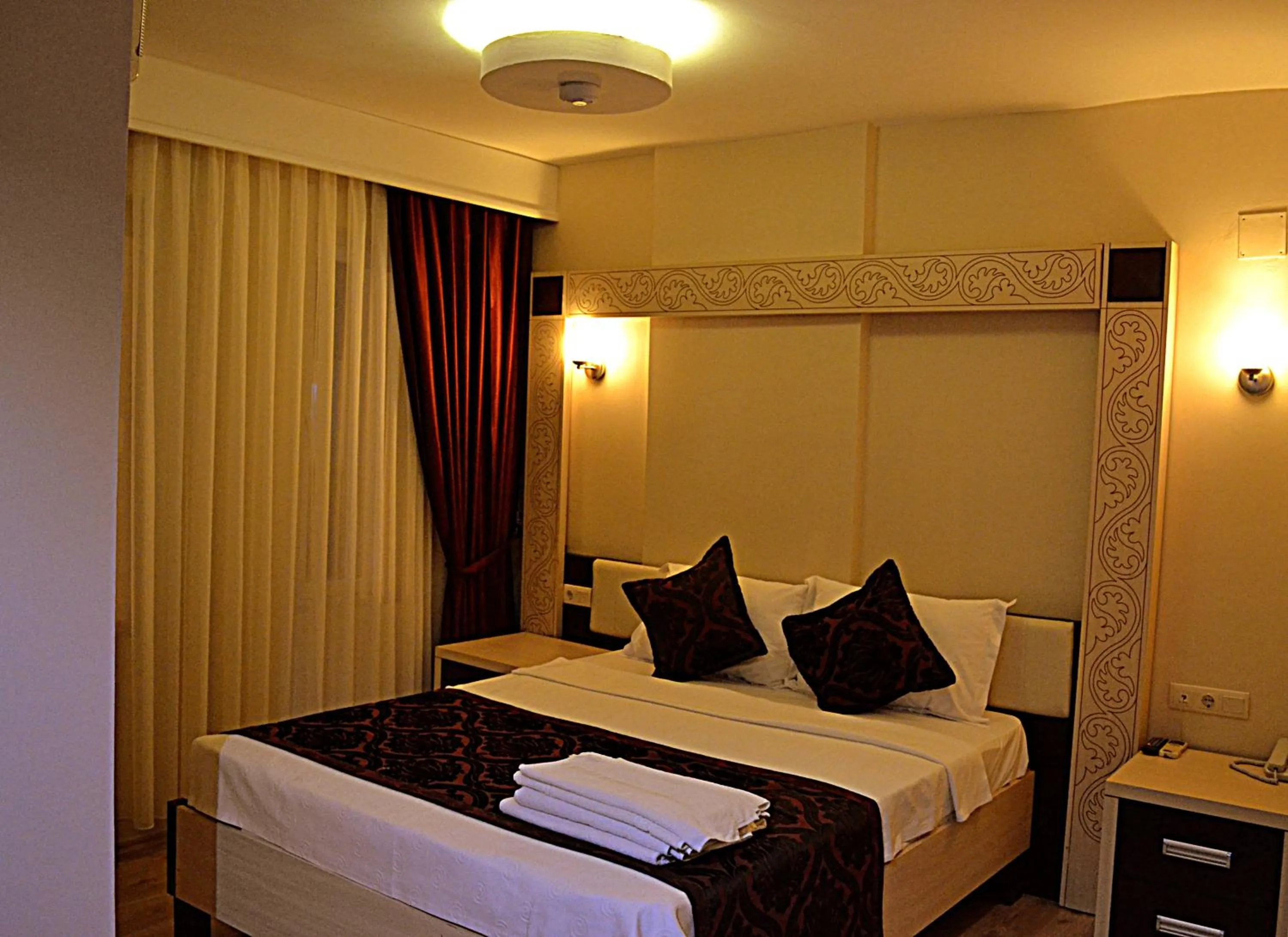 Bed in Rumana Hotel