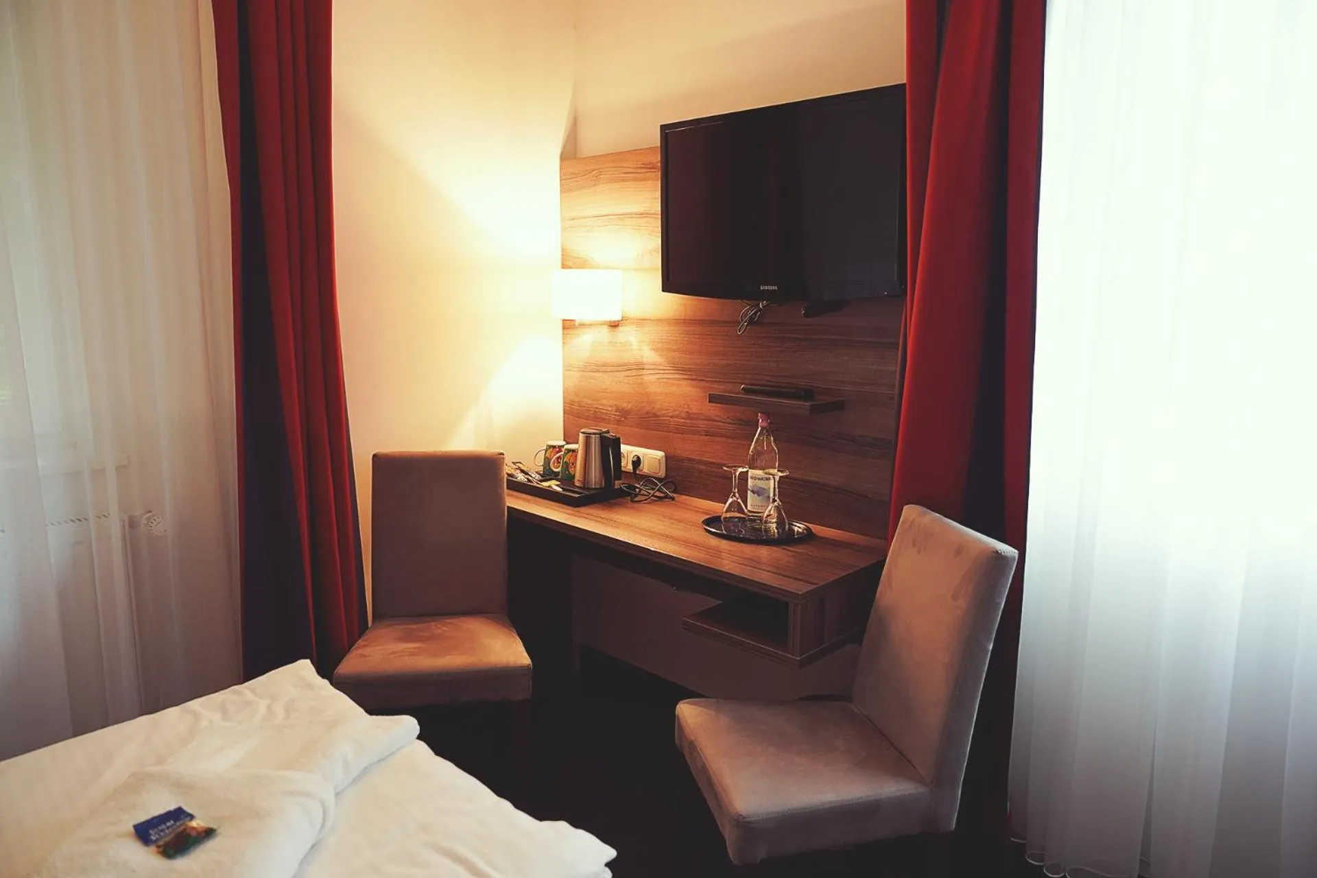 Communal lounge/ TV room, Bed in Hotel Mein Bergblick