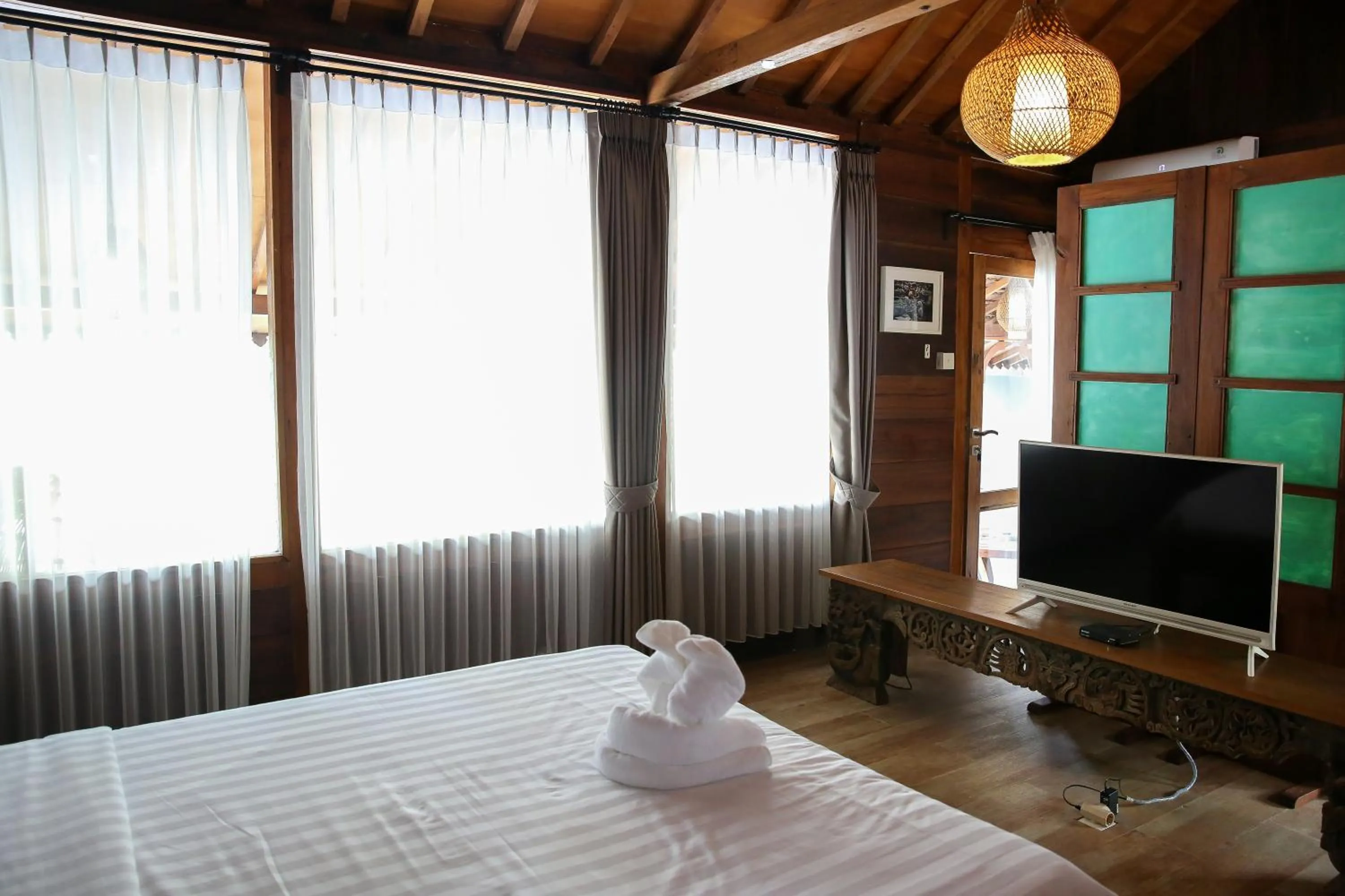 Bed in Avery Coconut Island Waterpark Beach Resort Carita