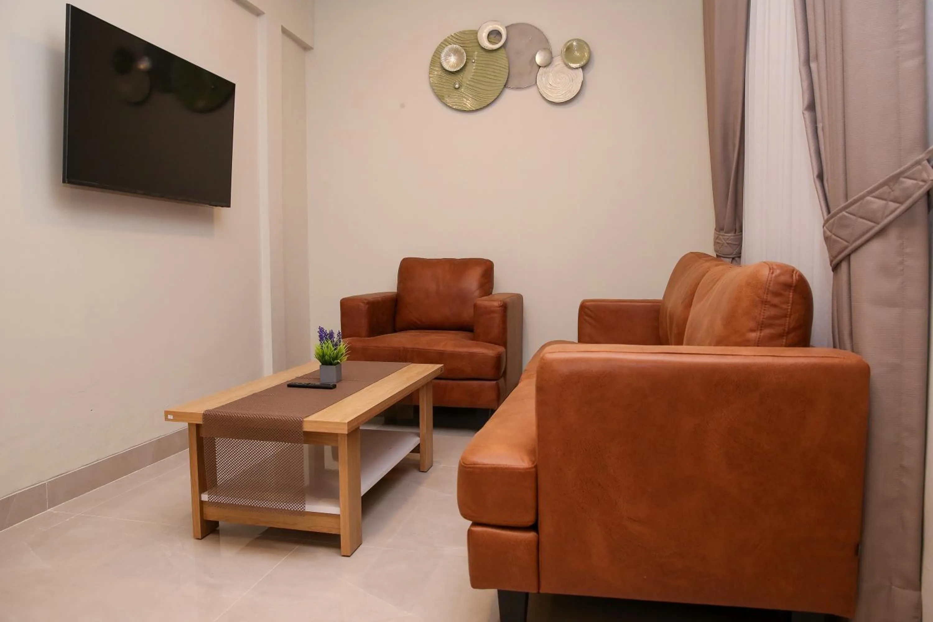 Living room in Avery Coconut Island Waterpark Beach Resort Carita