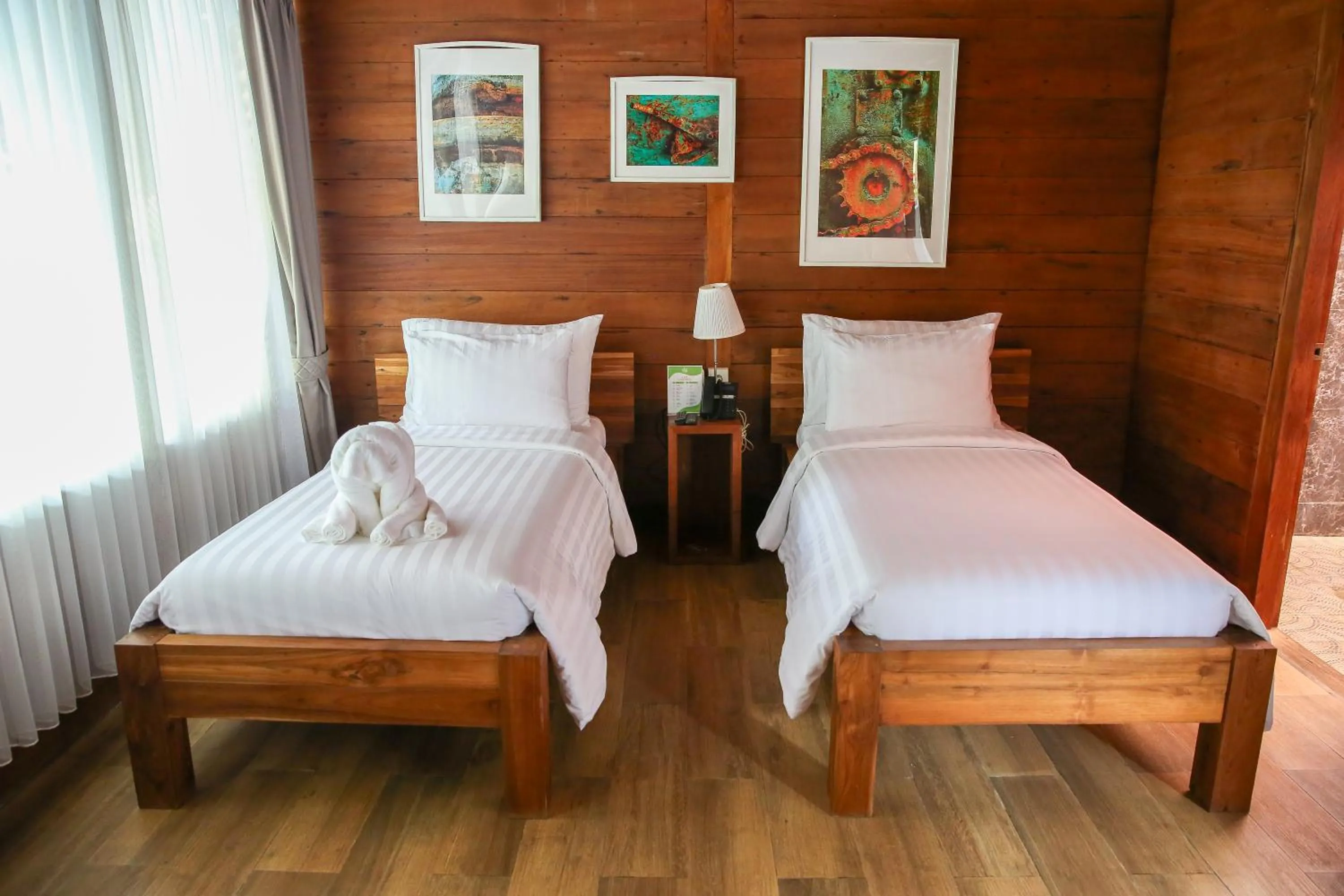 Bed in Avery Coconut Island Waterpark Beach Resort Carita