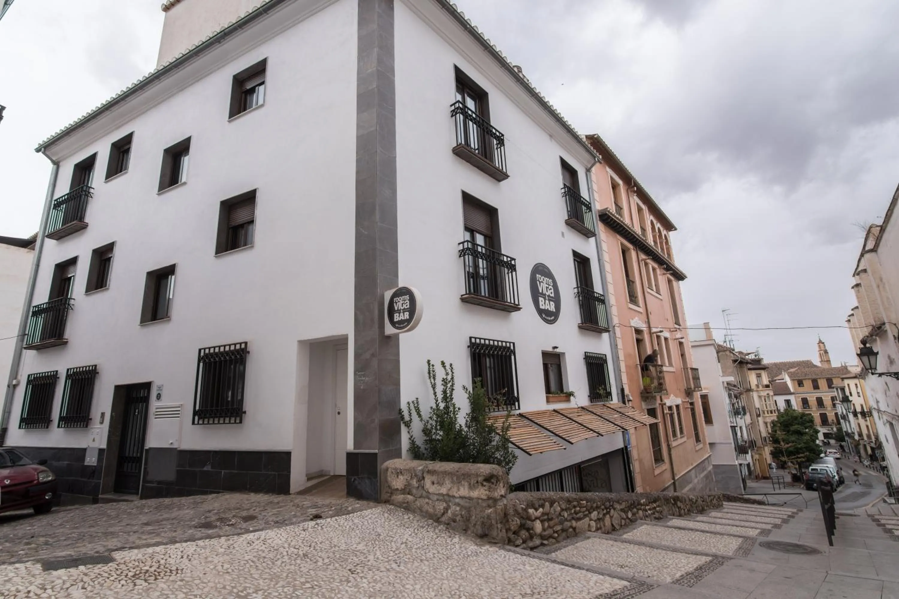 Property building in Rooms Vita