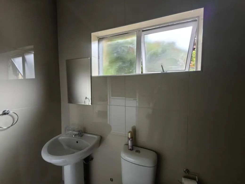 Bathroom in New Bali Guesthouse