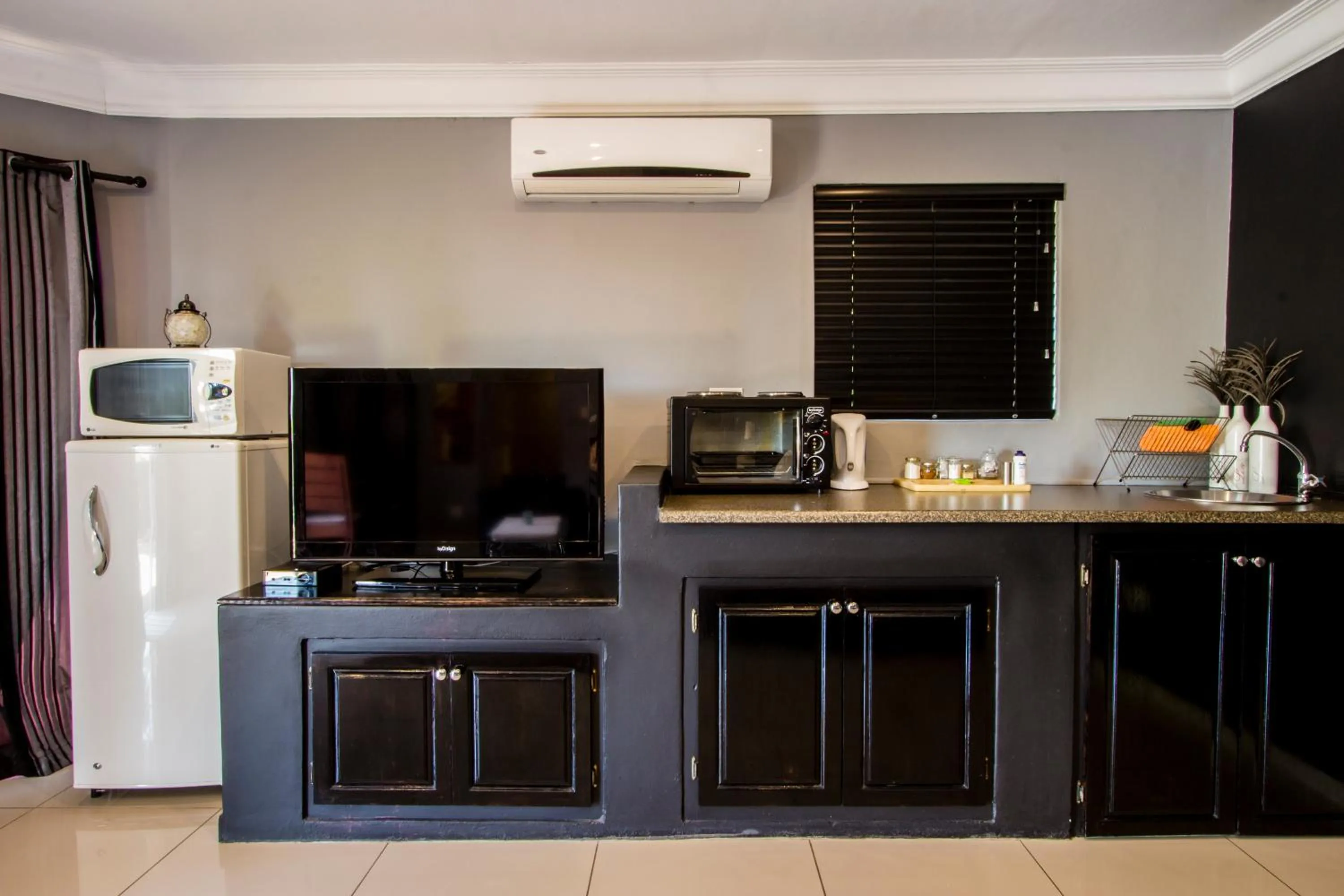 Kitchen or kitchenette in New Bali Guesthouse