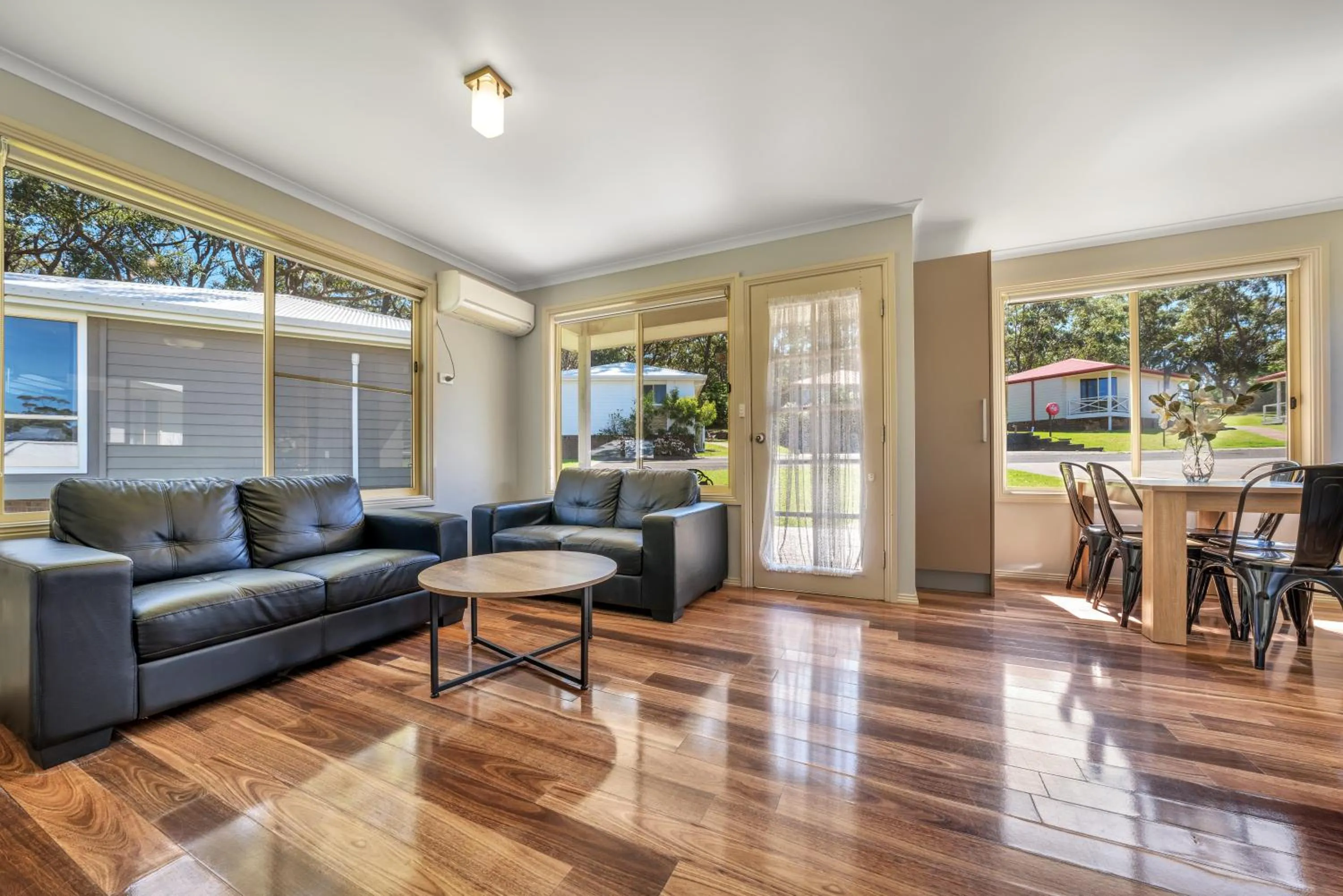 Living room in Ingenia Holidays Ulladulla