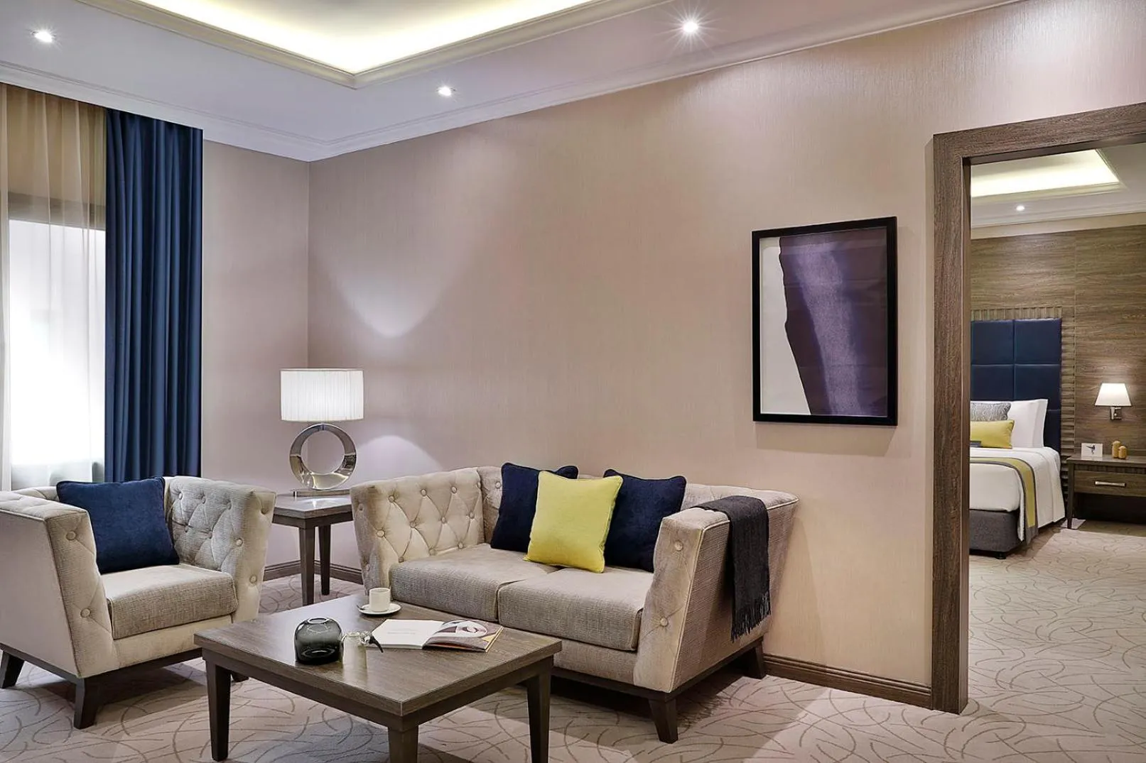 Living room, Bed in voco Al Khobar by IHG