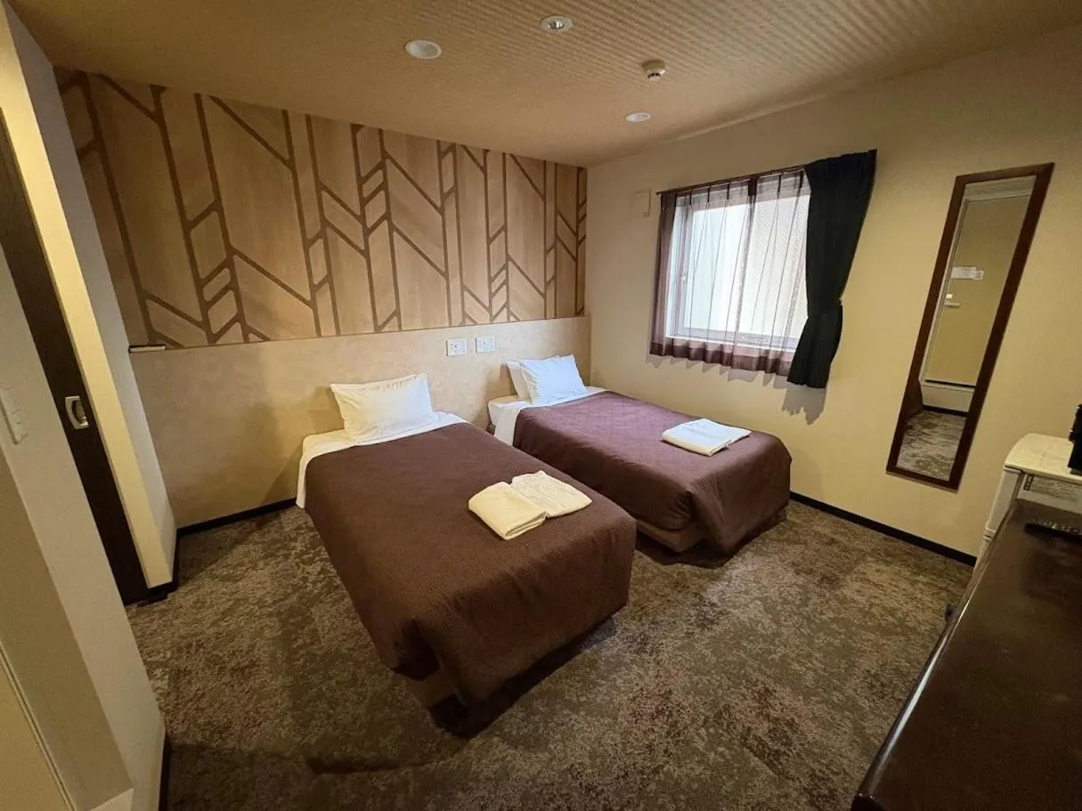 Bed in HOTEL LiVEMAX Himeji Ekimae