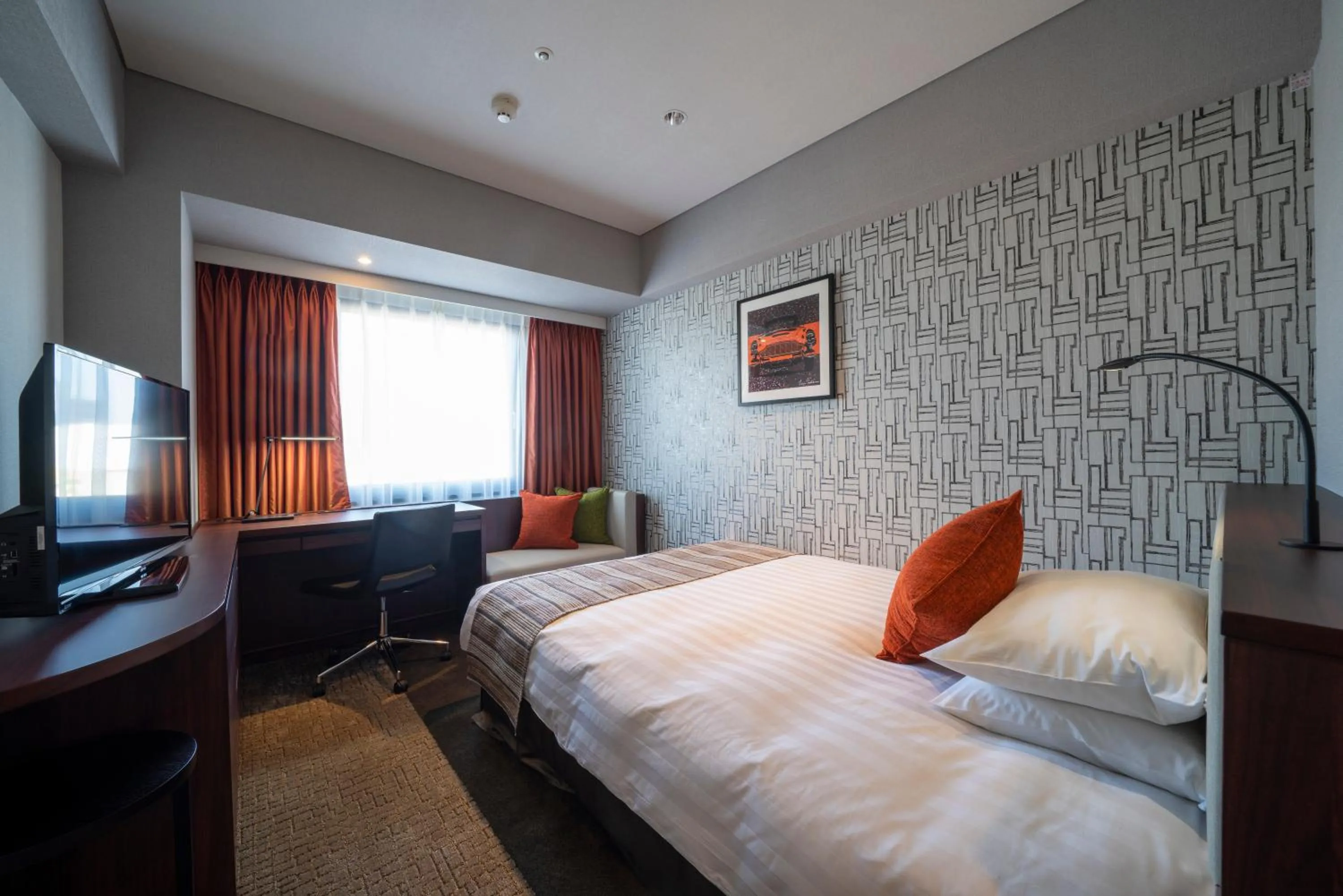 Bed in Meitetsu Toyota Hotel