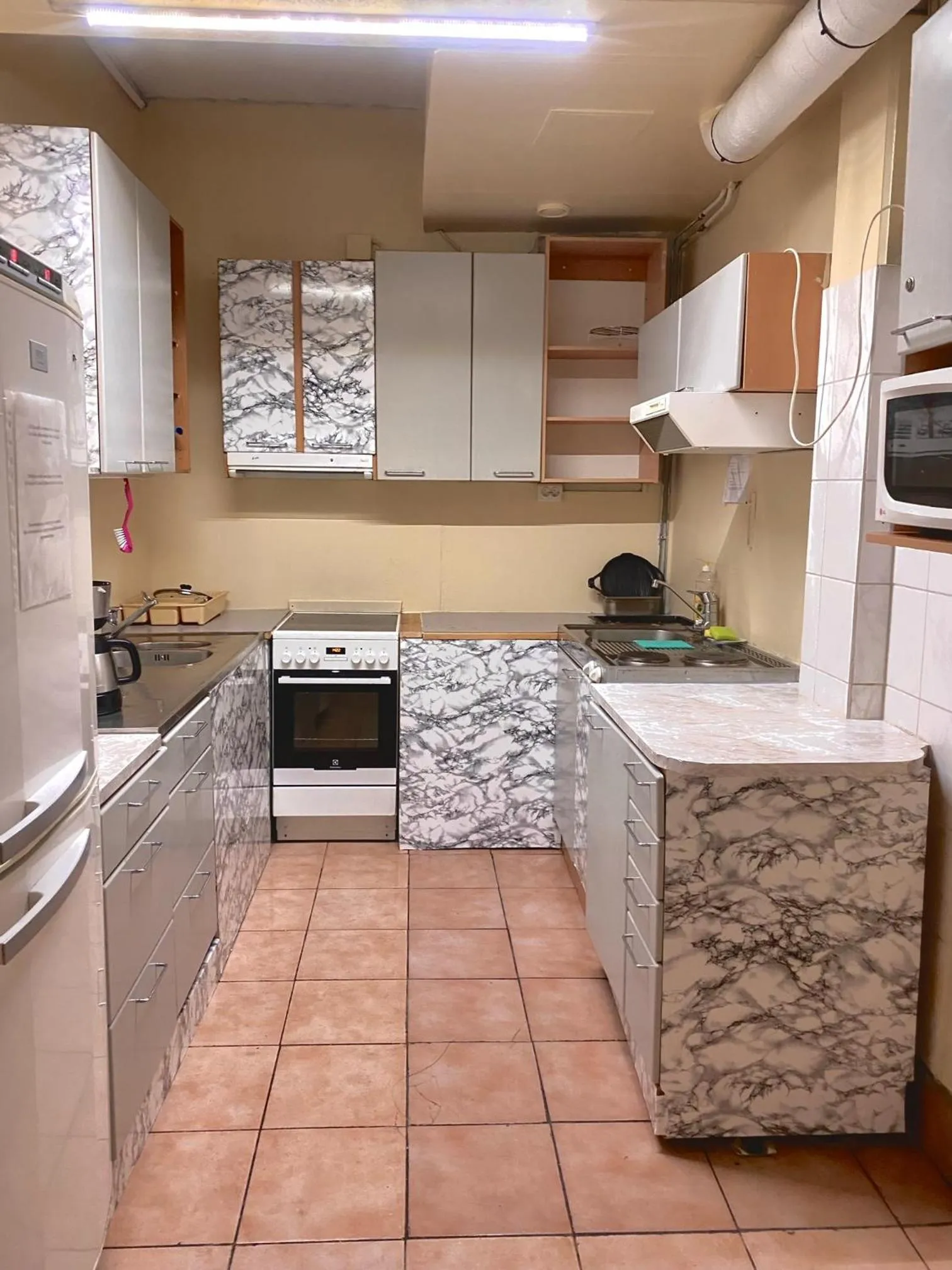 Kitchen or kitchenette in Arkadia Hotel & Hostel