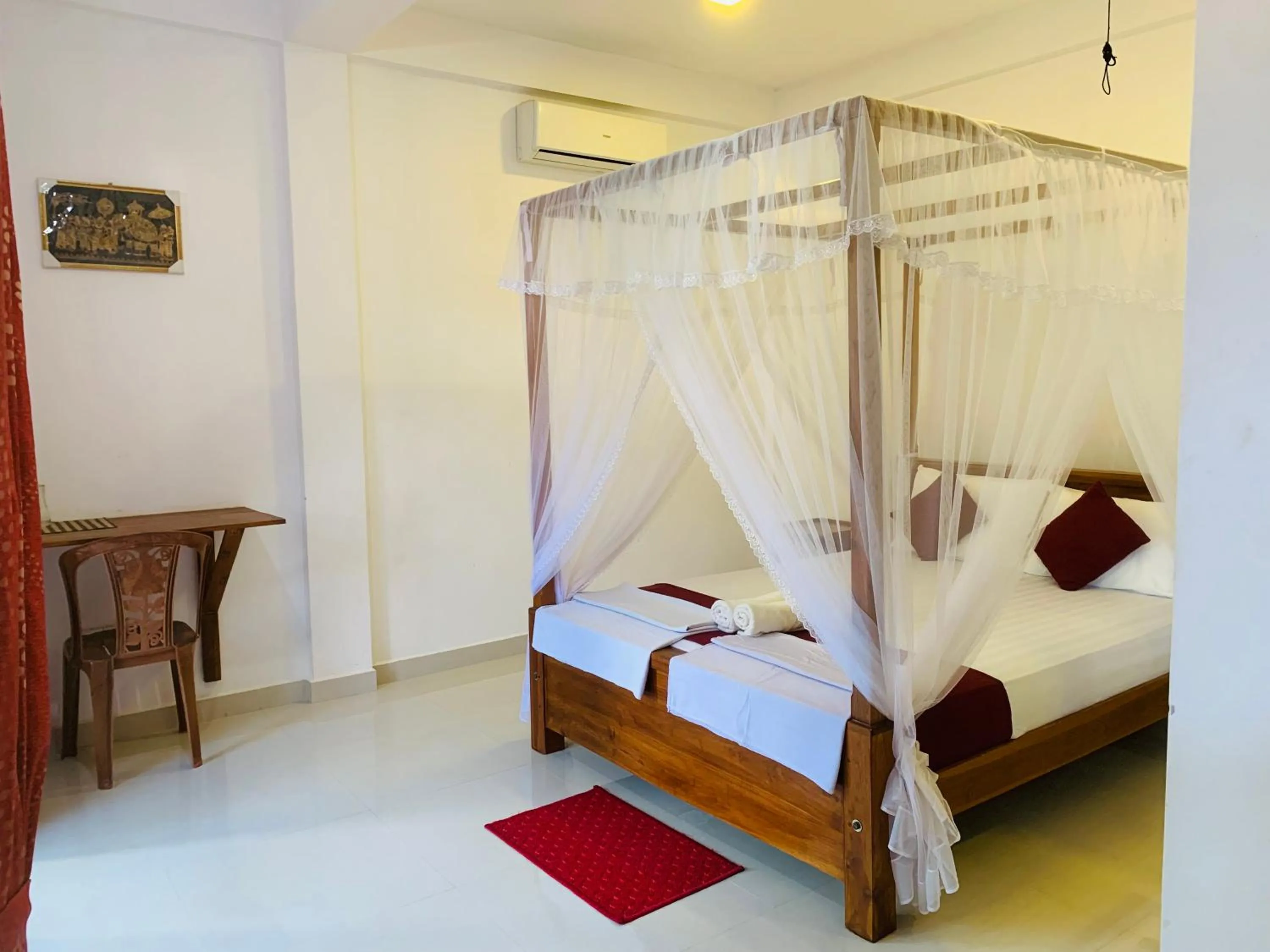 Photo of the whole room, Bed in Sinhagiri Villa