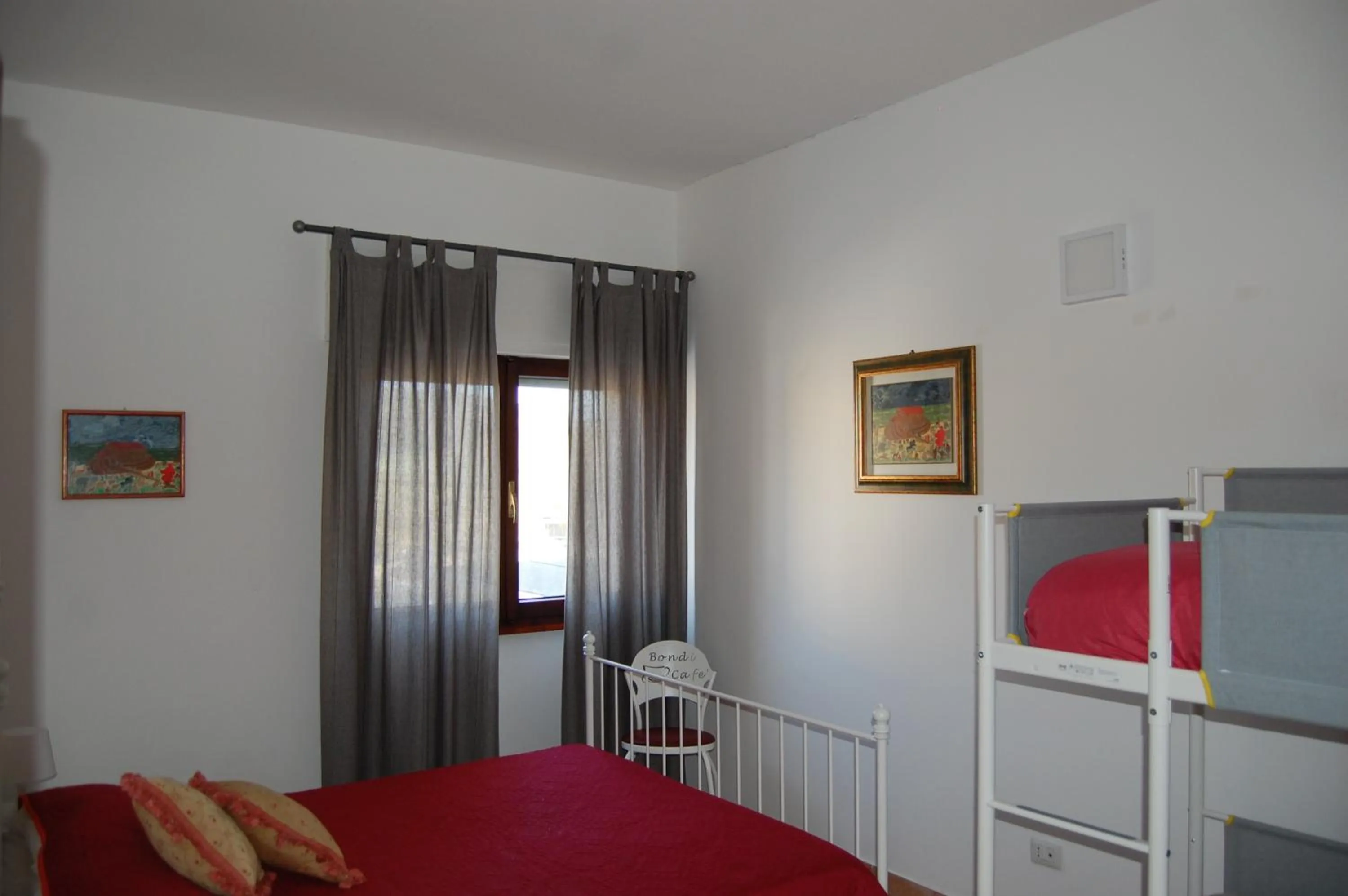 Photo of the whole room, Bed in Le casette di Frà al Bondì