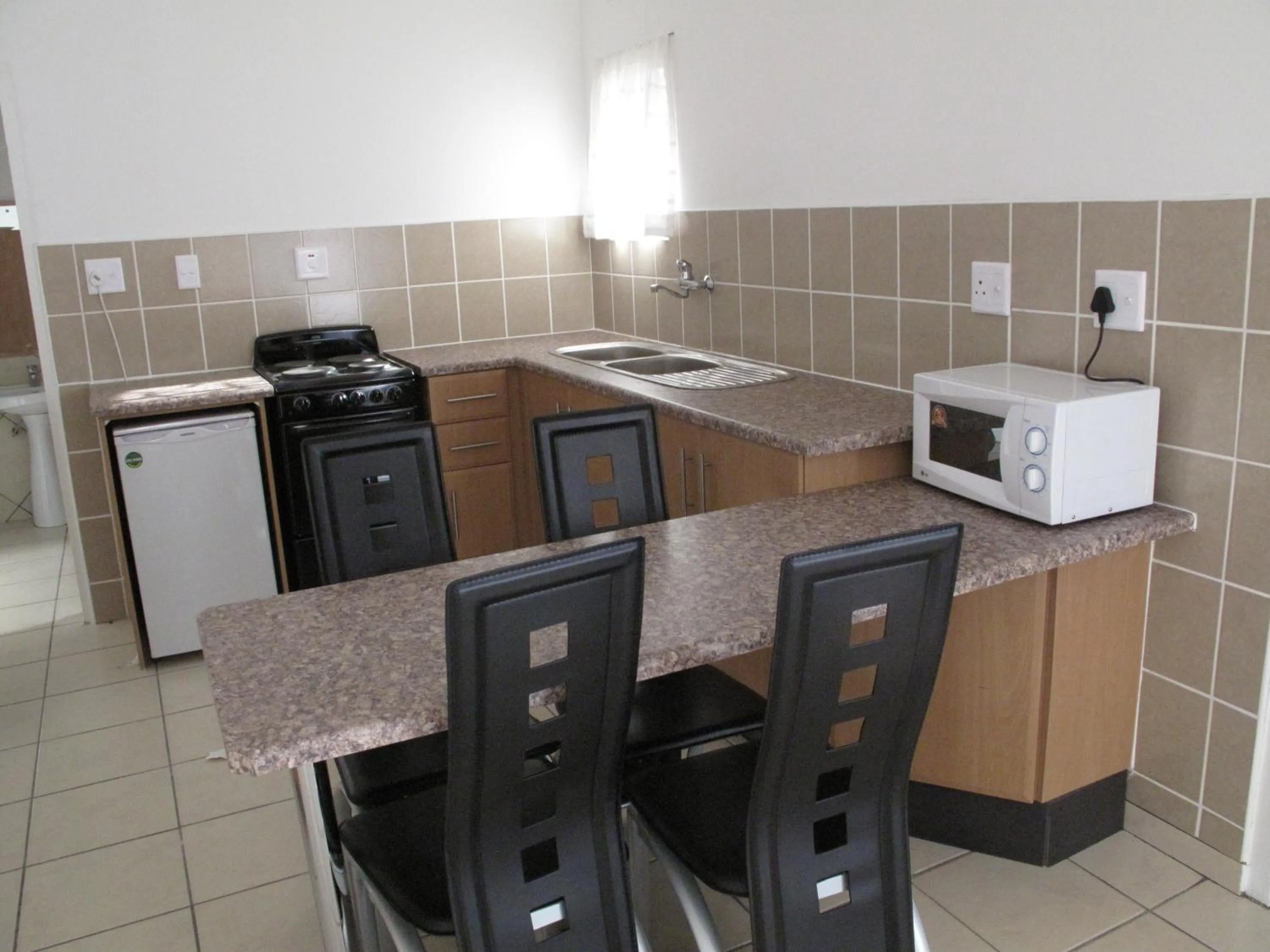 Kitchen or kitchenette in The Crescent Guesthouses - BnB/Self Catering