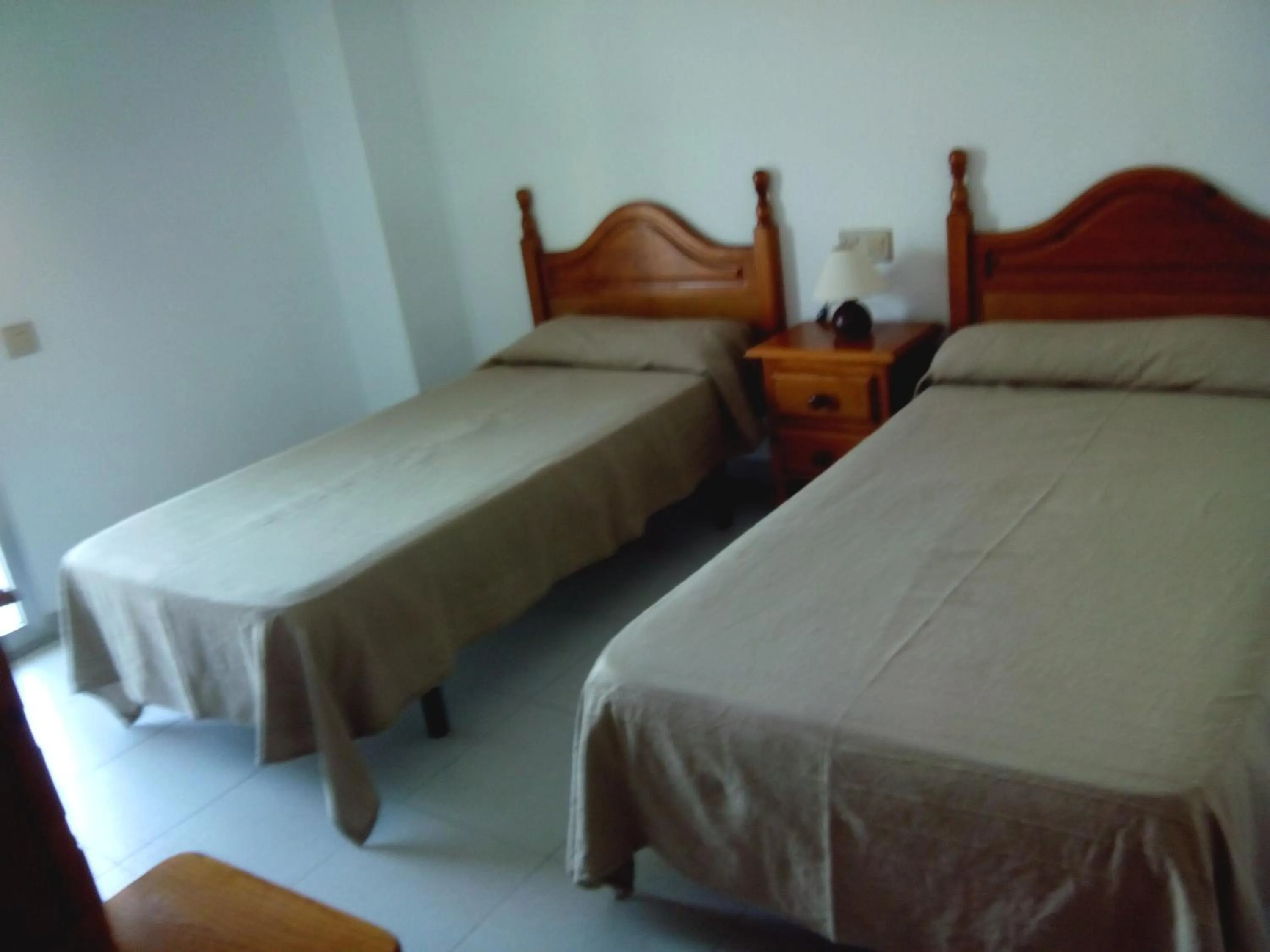 Bedroom, Bed in Apartamentos Mary