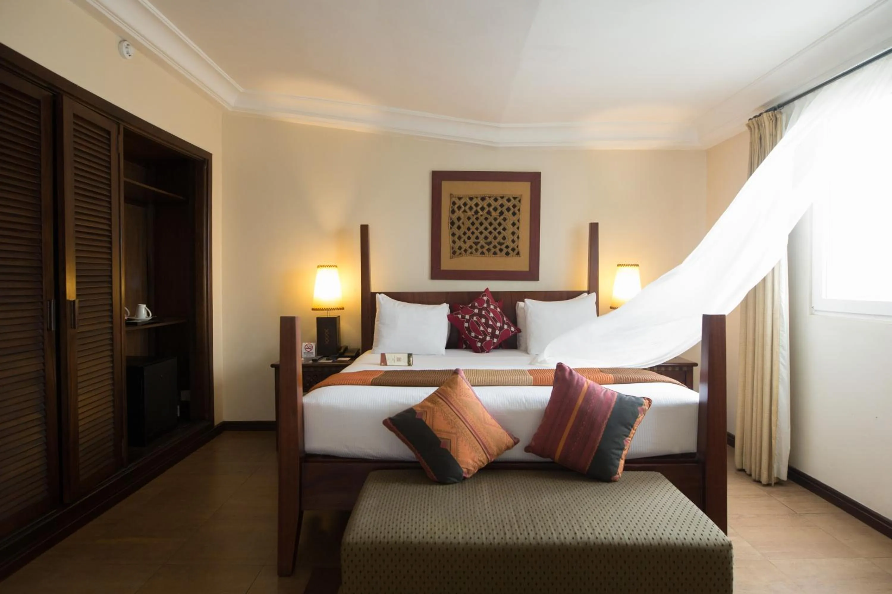 Bed in The African Regent Hotel