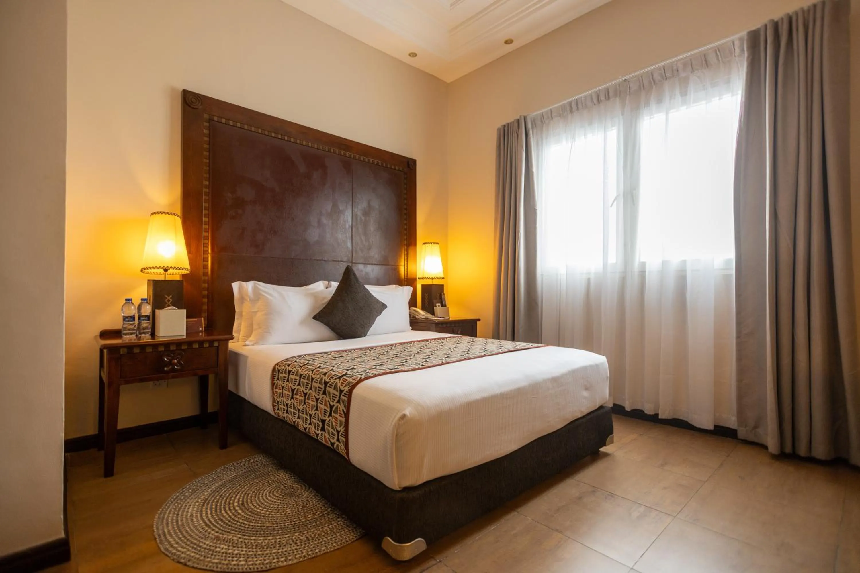 Bed in The African Regent Hotel