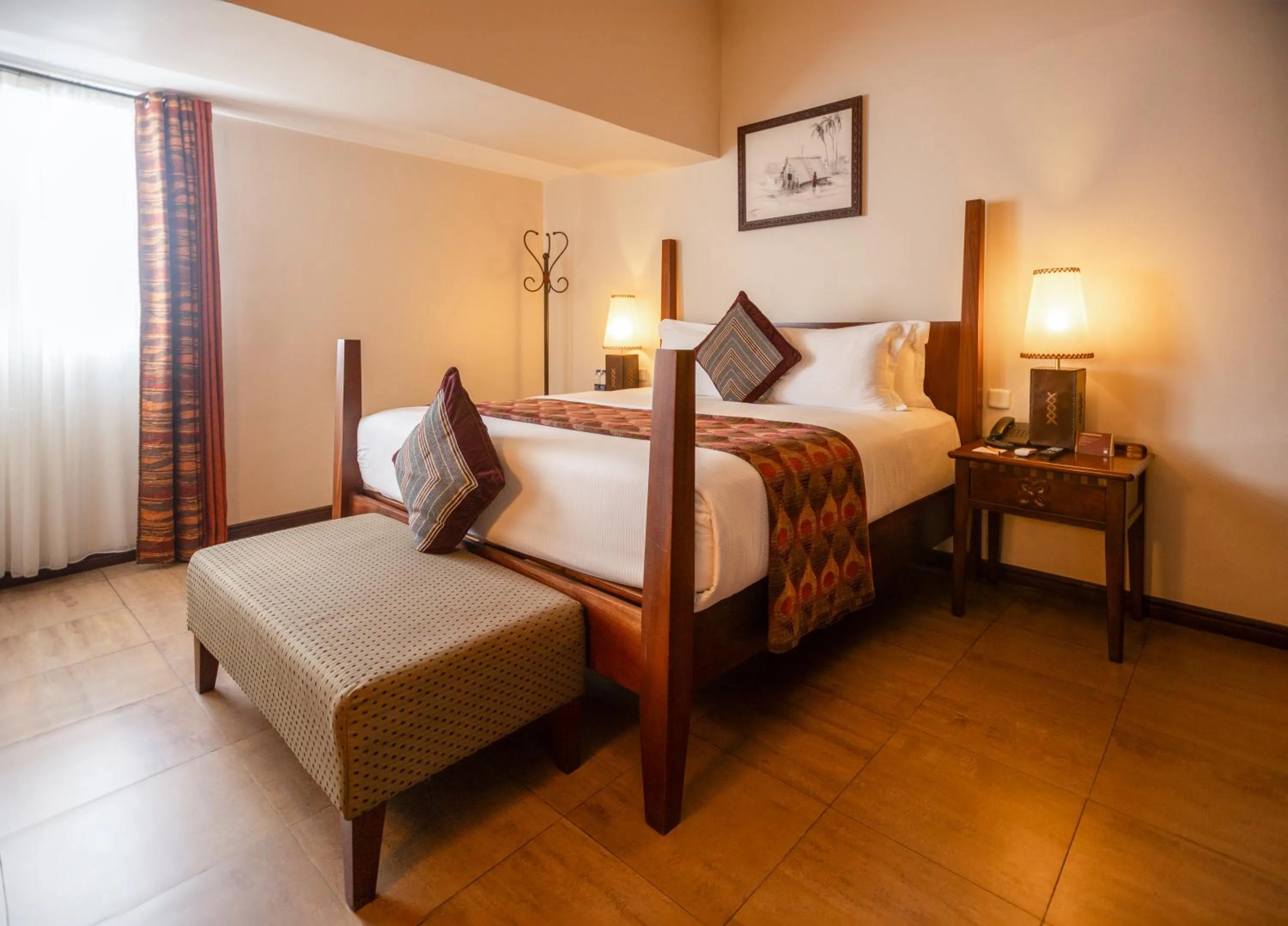 Bed in The African Regent Hotel