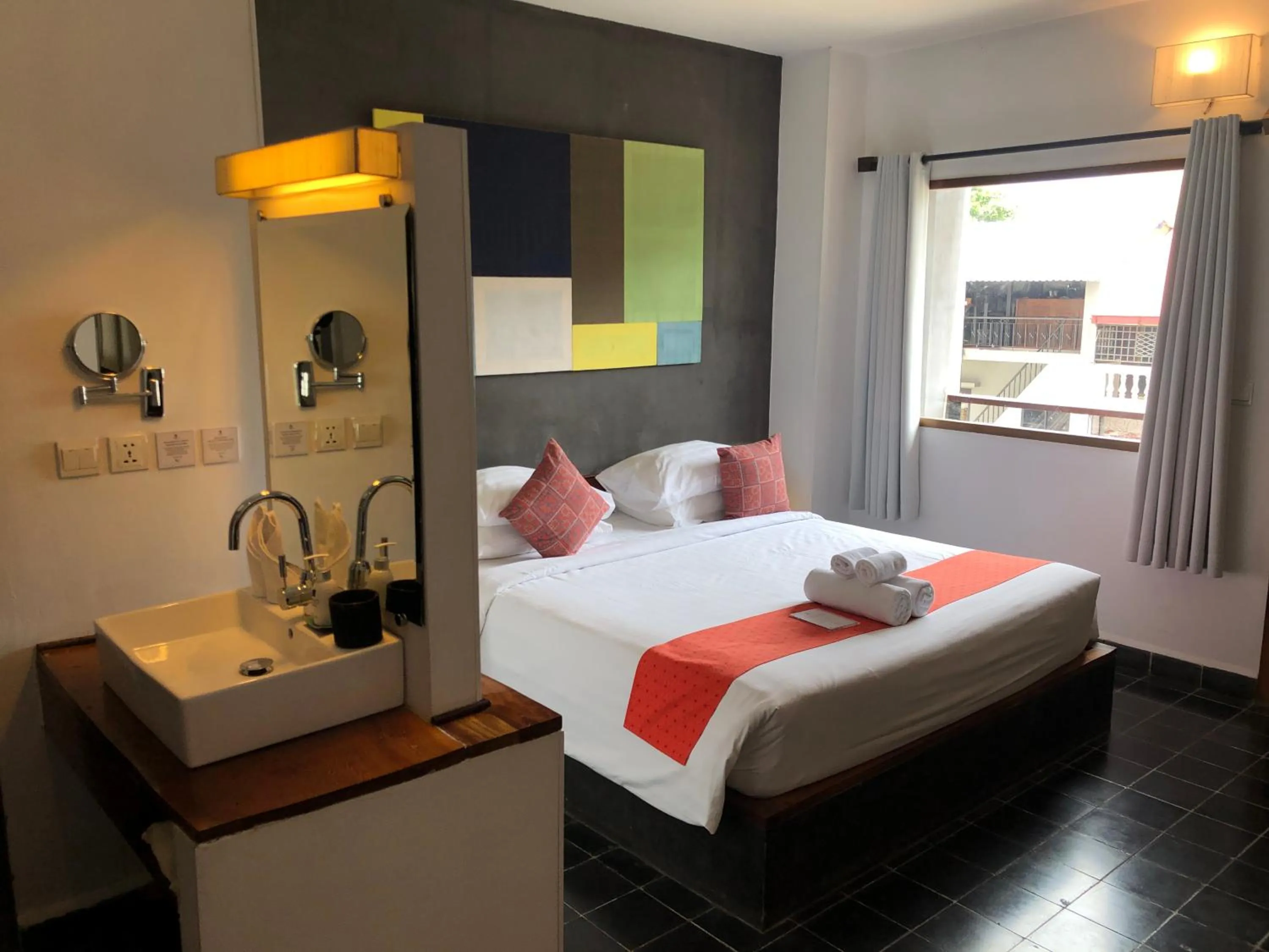 Bed in PATIO Hotel & Urban Resort