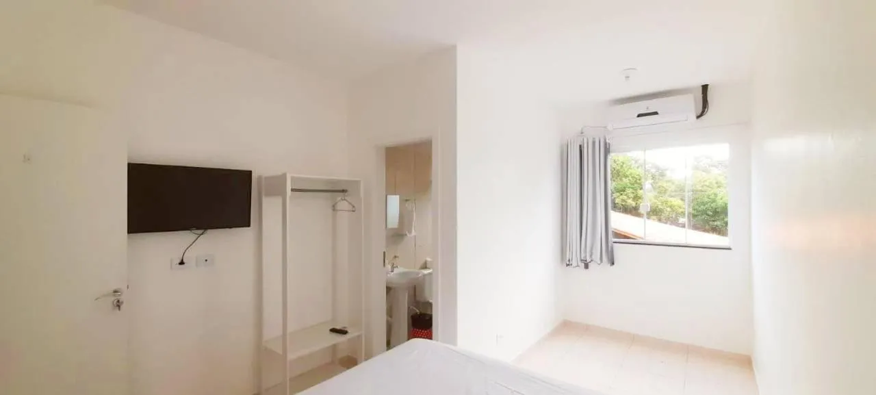 Bed in Pousada Pontal do Sul