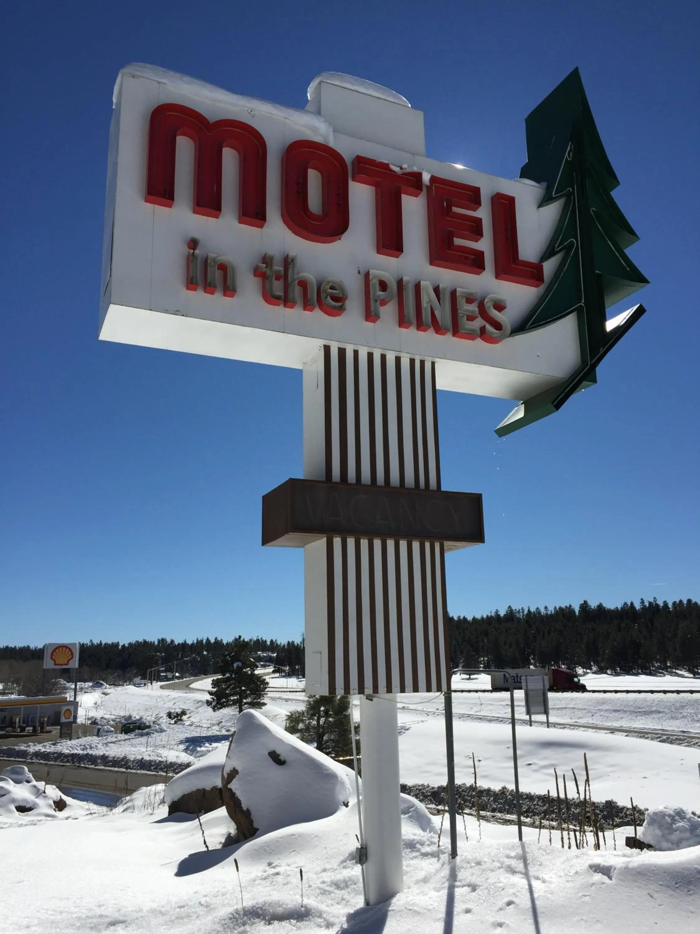 Property logo or sign in Motel In The Pines