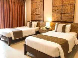 Bed in The Pannarai Hotel