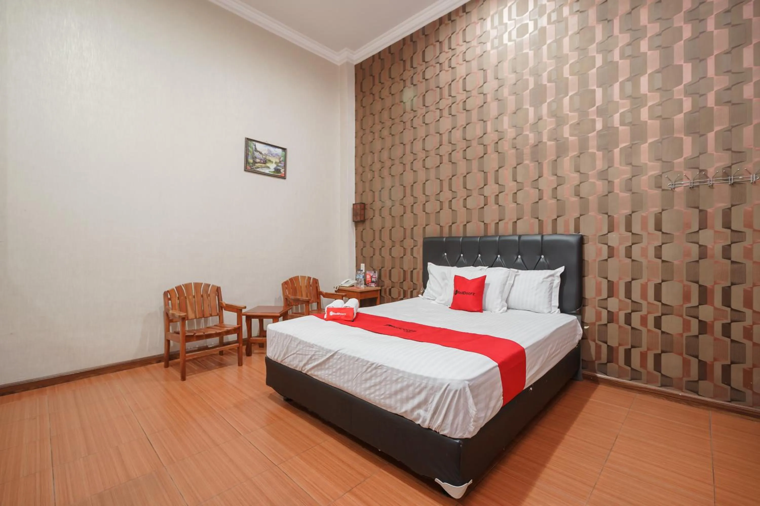 Bed in RedDoorz at Sedayu 2 Near Danau Toba Parapat