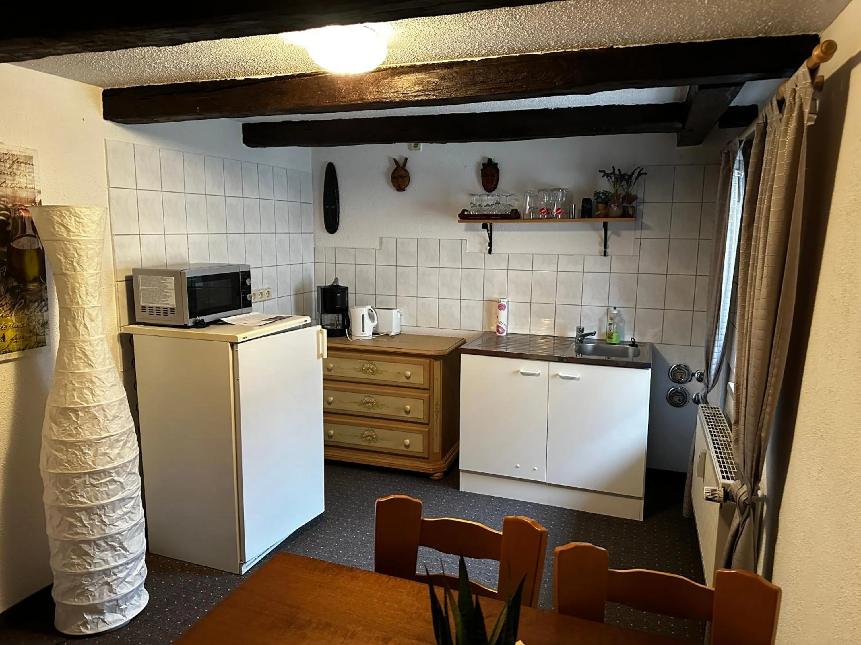 Kitchen or kitchenette in Pension Zum Fäßchen