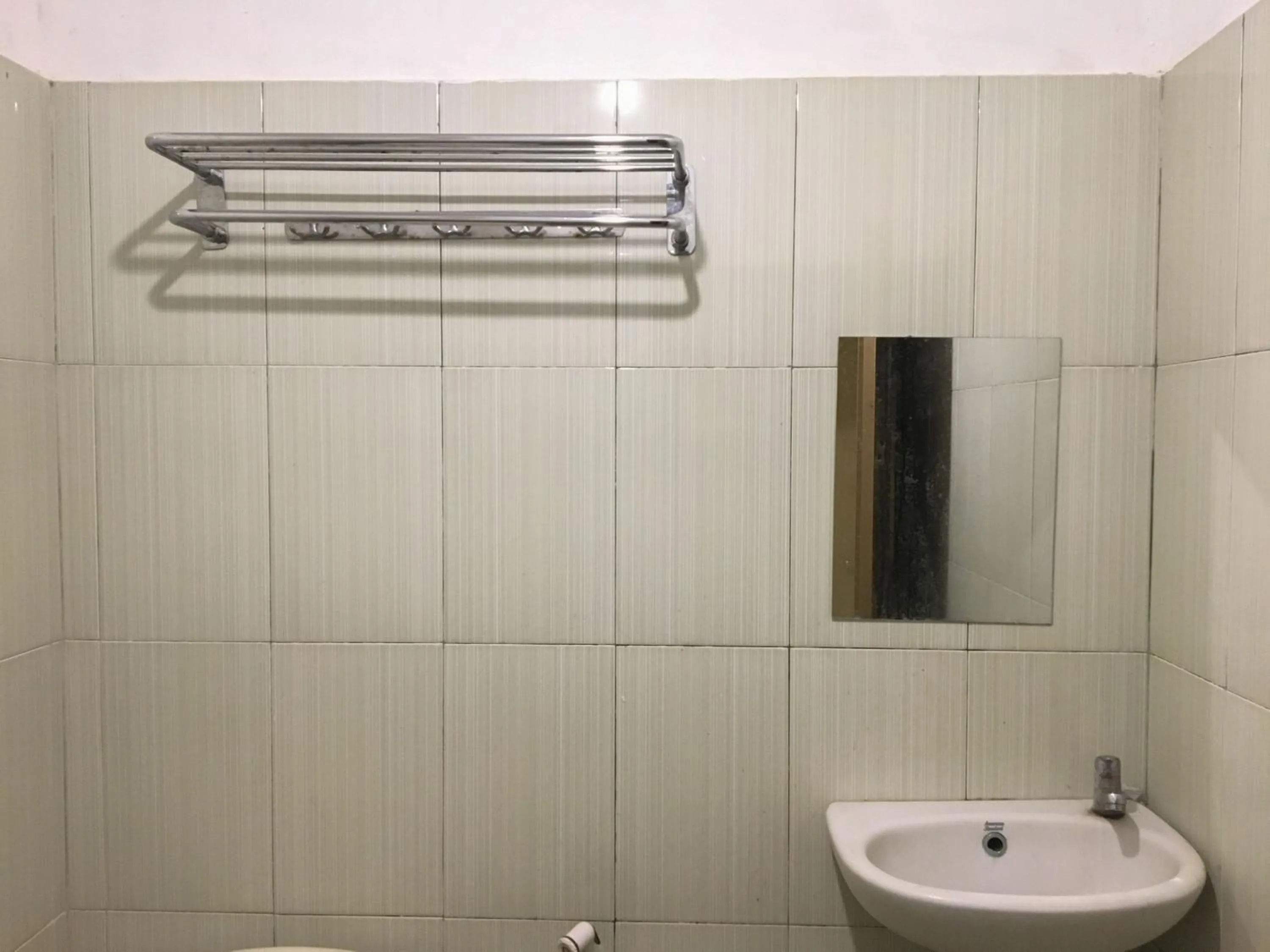 Bathroom in RedDoorz near RSU Bunda Thamrin Medan