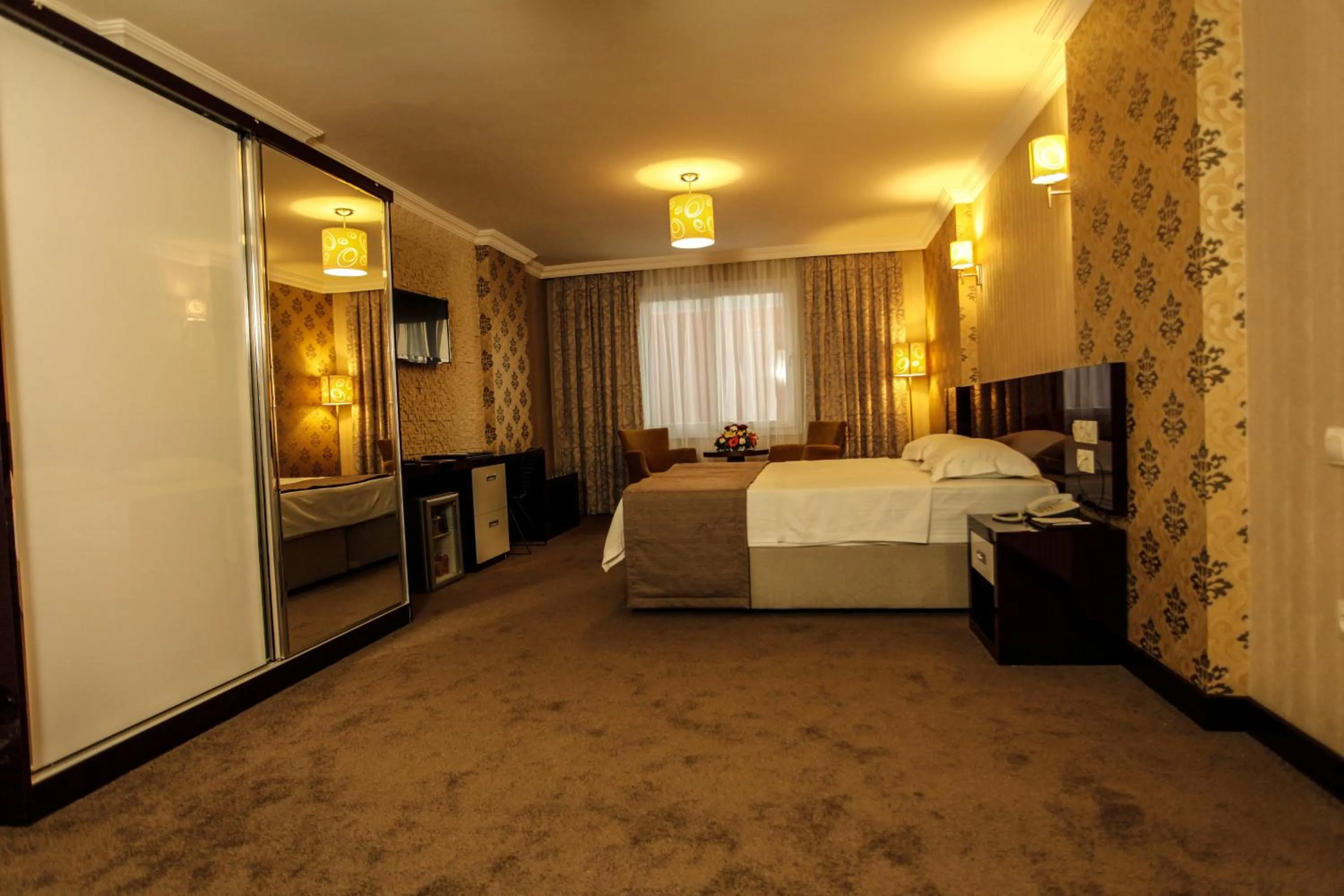 Photo of the whole room, Bed in Grand Akçalı Otel