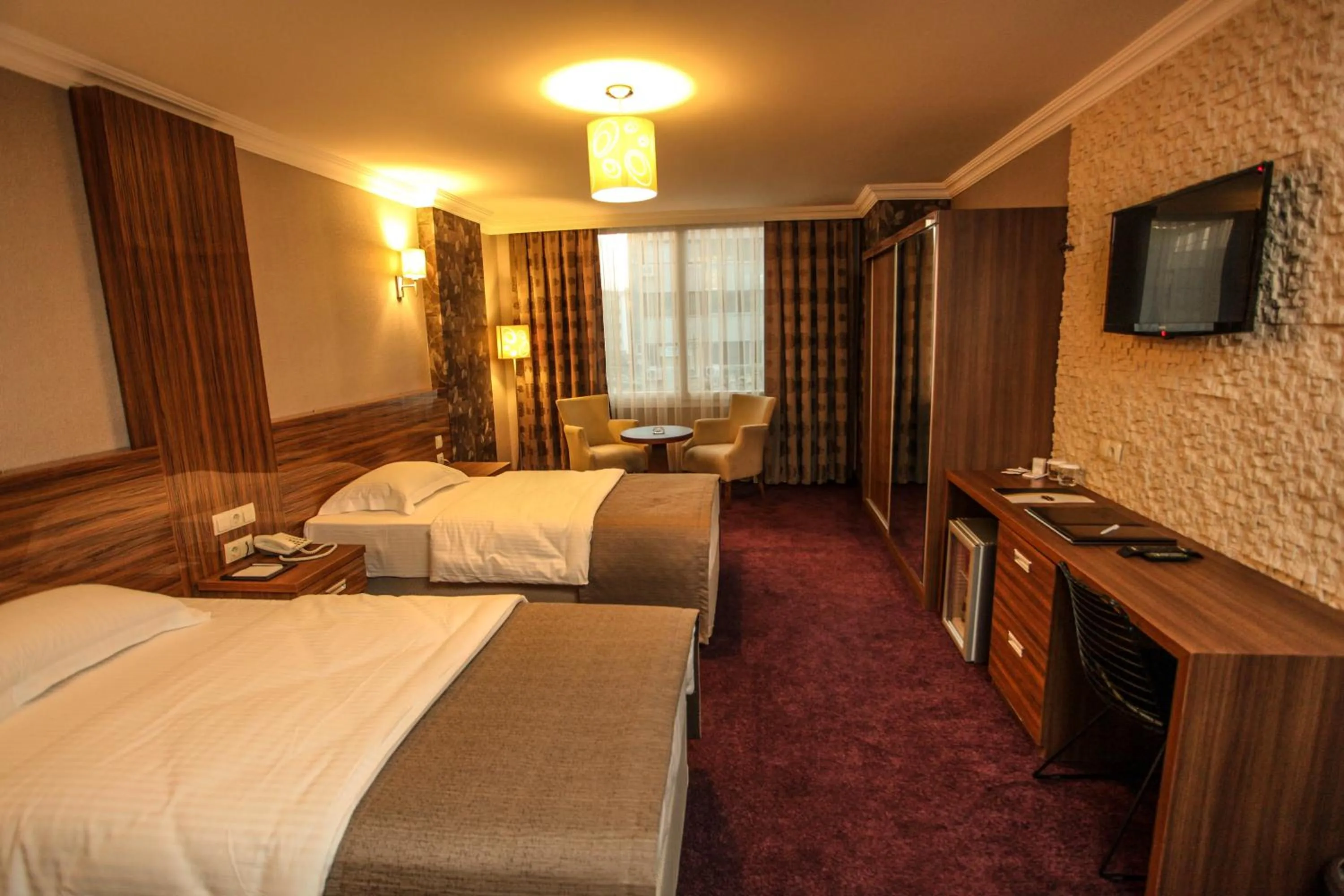 Photo of the whole room, Bed in Grand Akçalı Otel