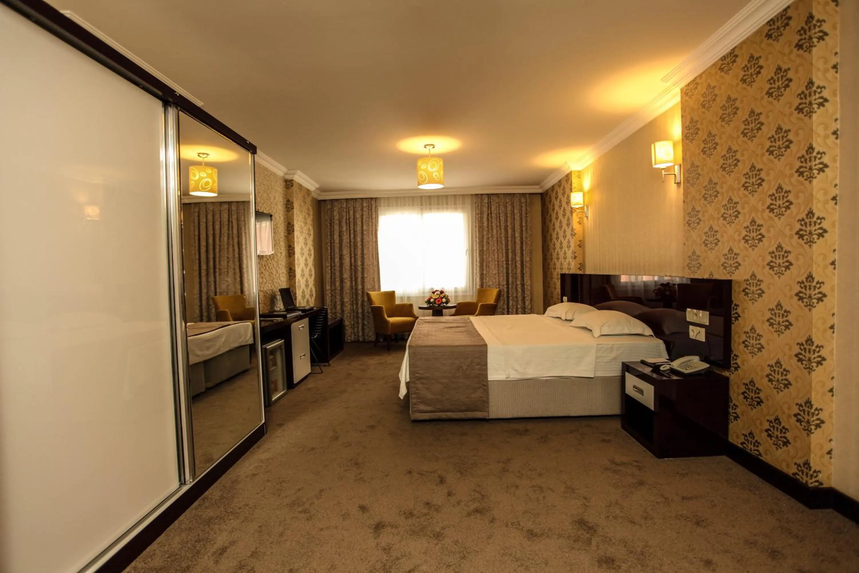 Photo of the whole room, Bed in Grand Akçalı Otel