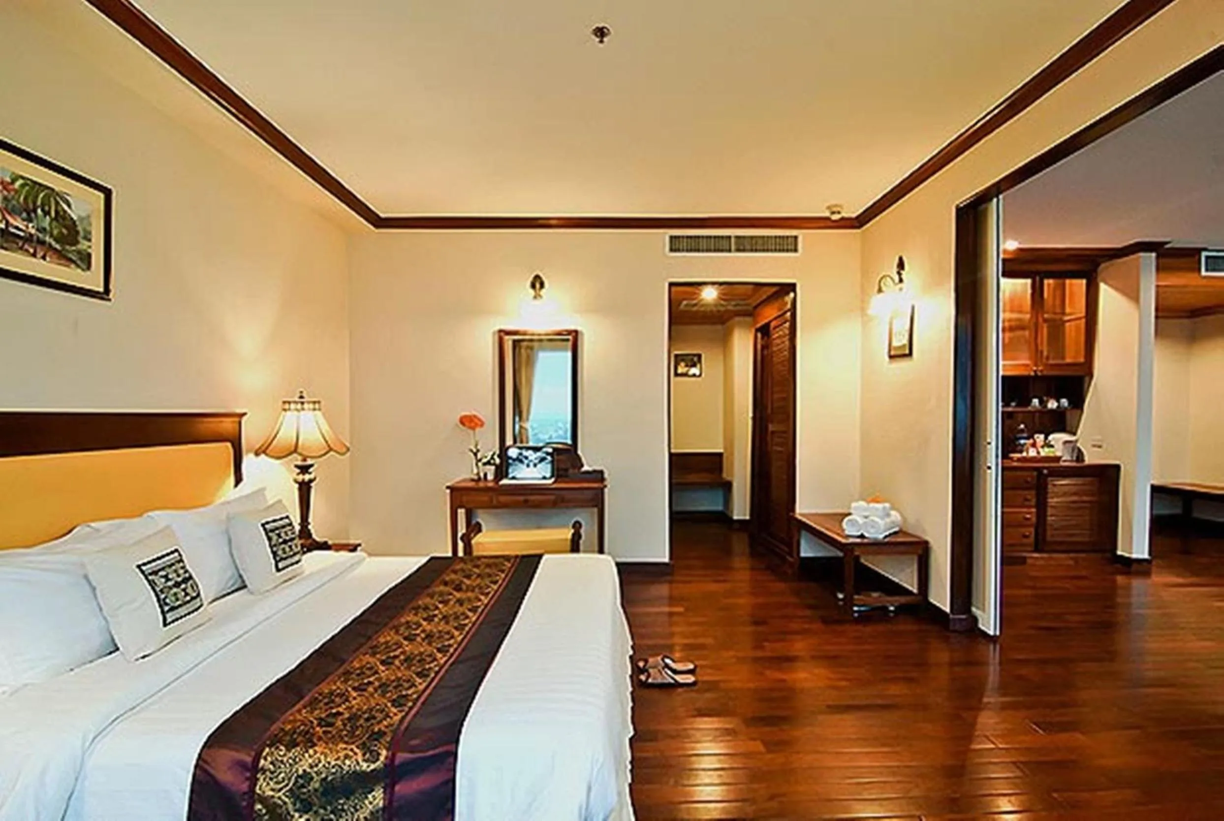 Bed in Champasak Grand Hotel