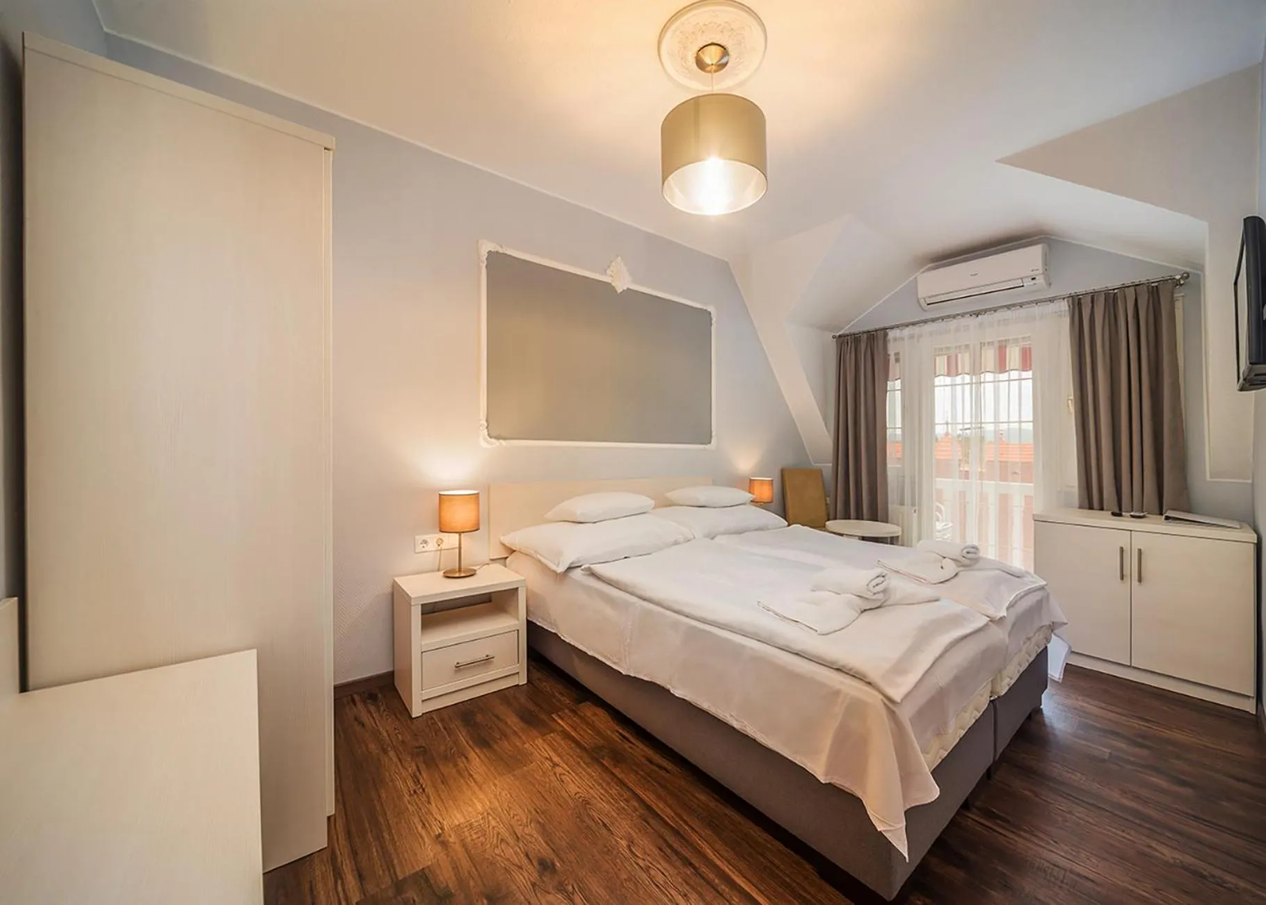 Bed in Tokajer Wellness Panzió