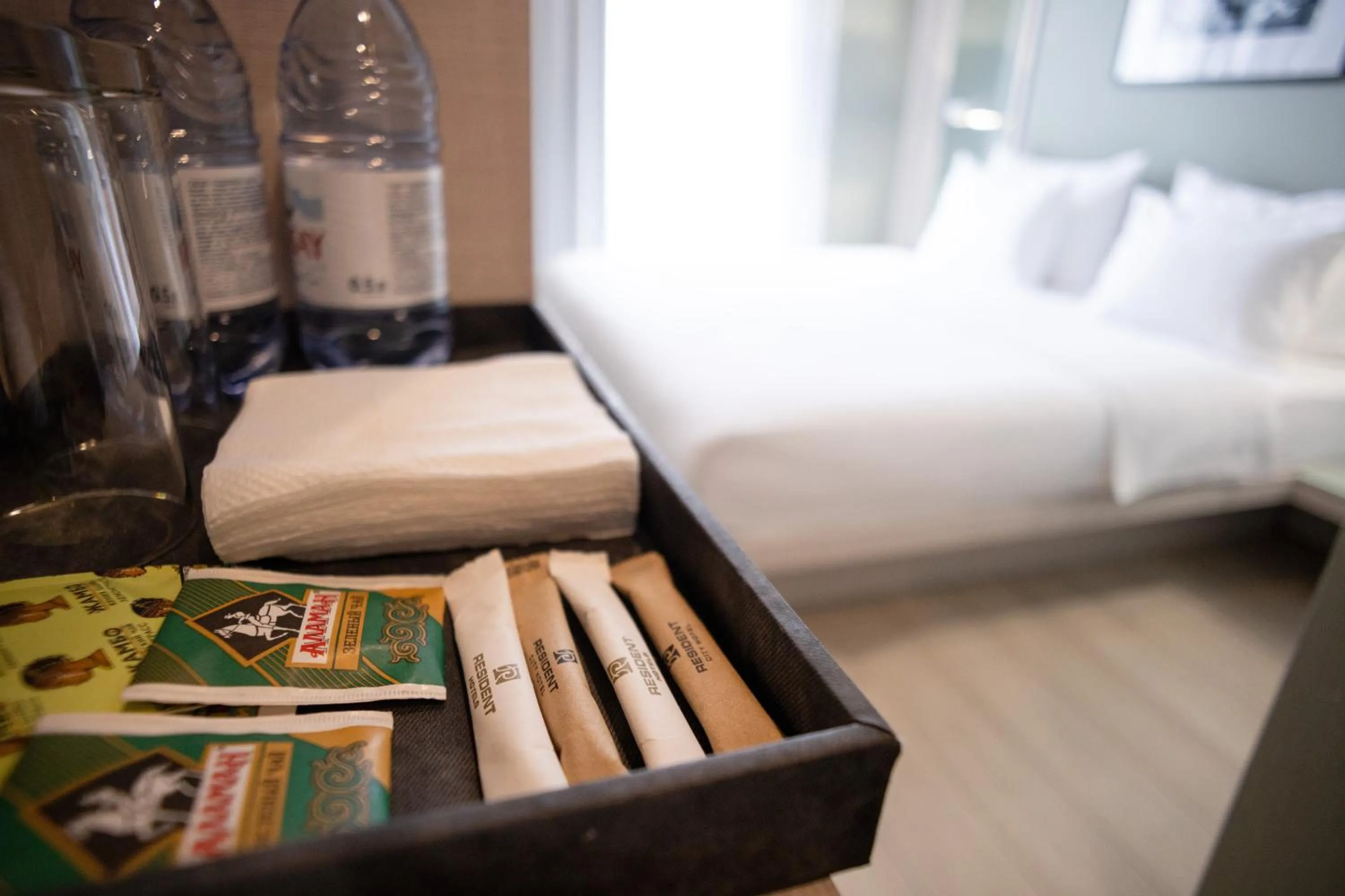 Bed in Resident City Hotel