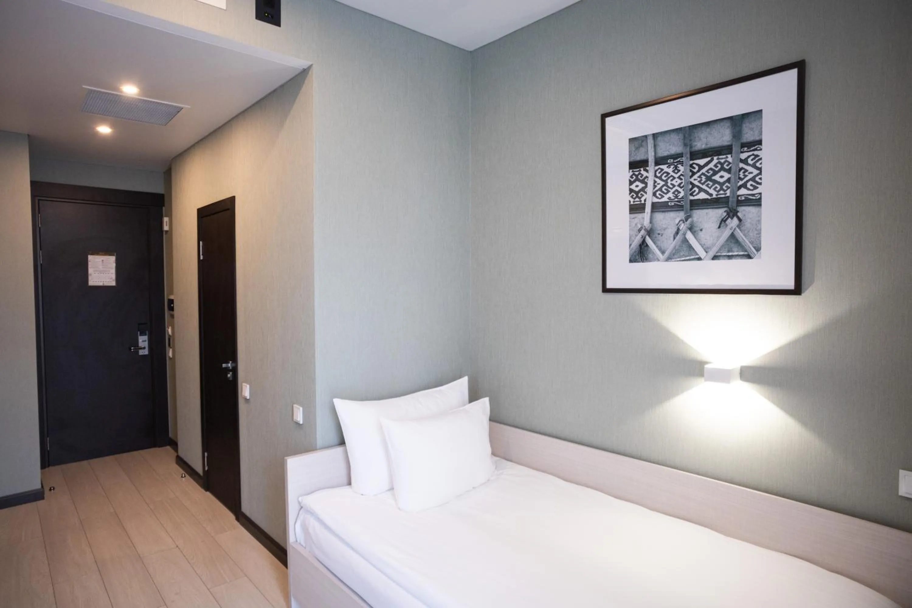 Bed in Resident City Hotel