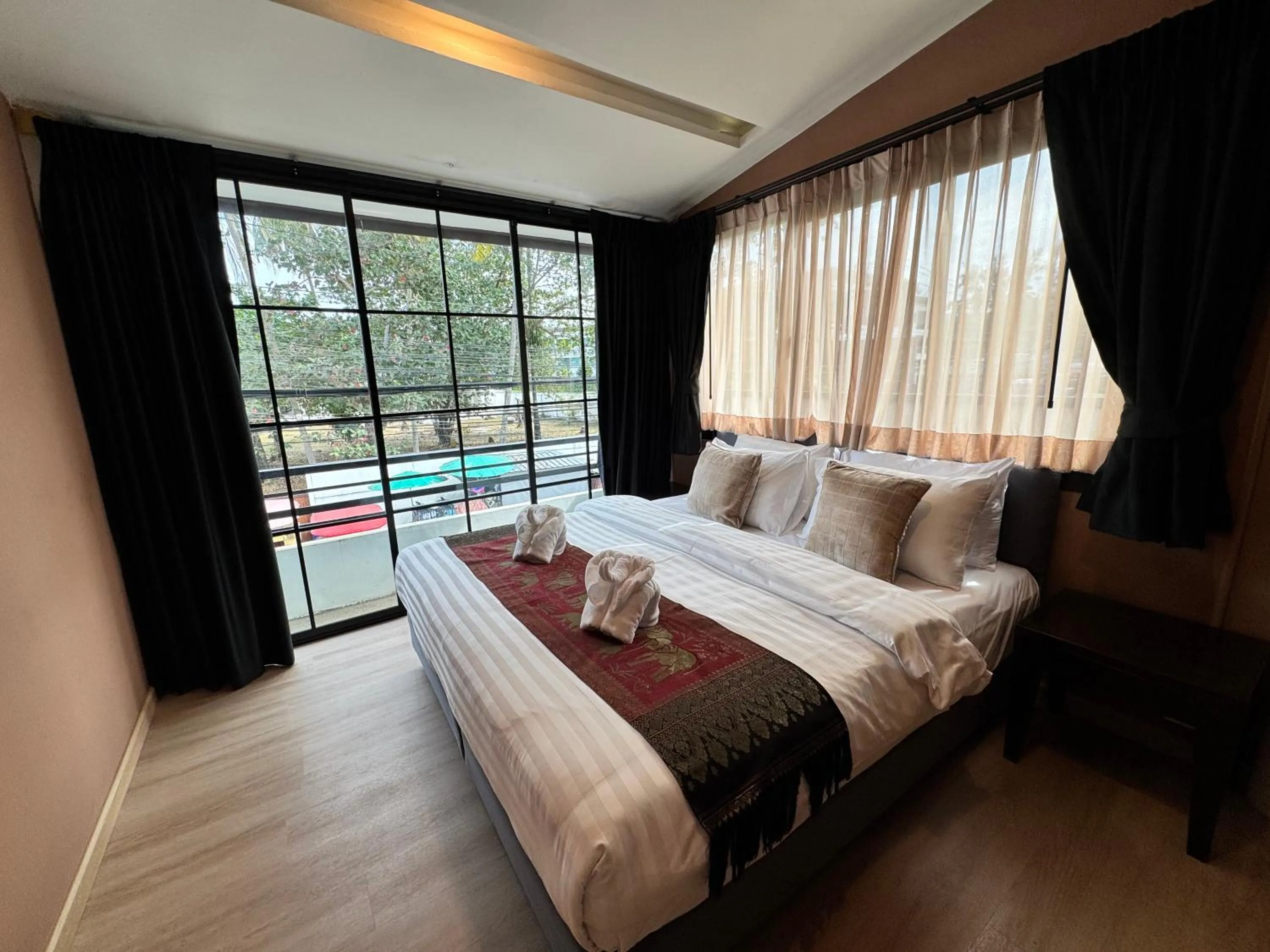 Bed in Naiyang Discovery Beach Resort