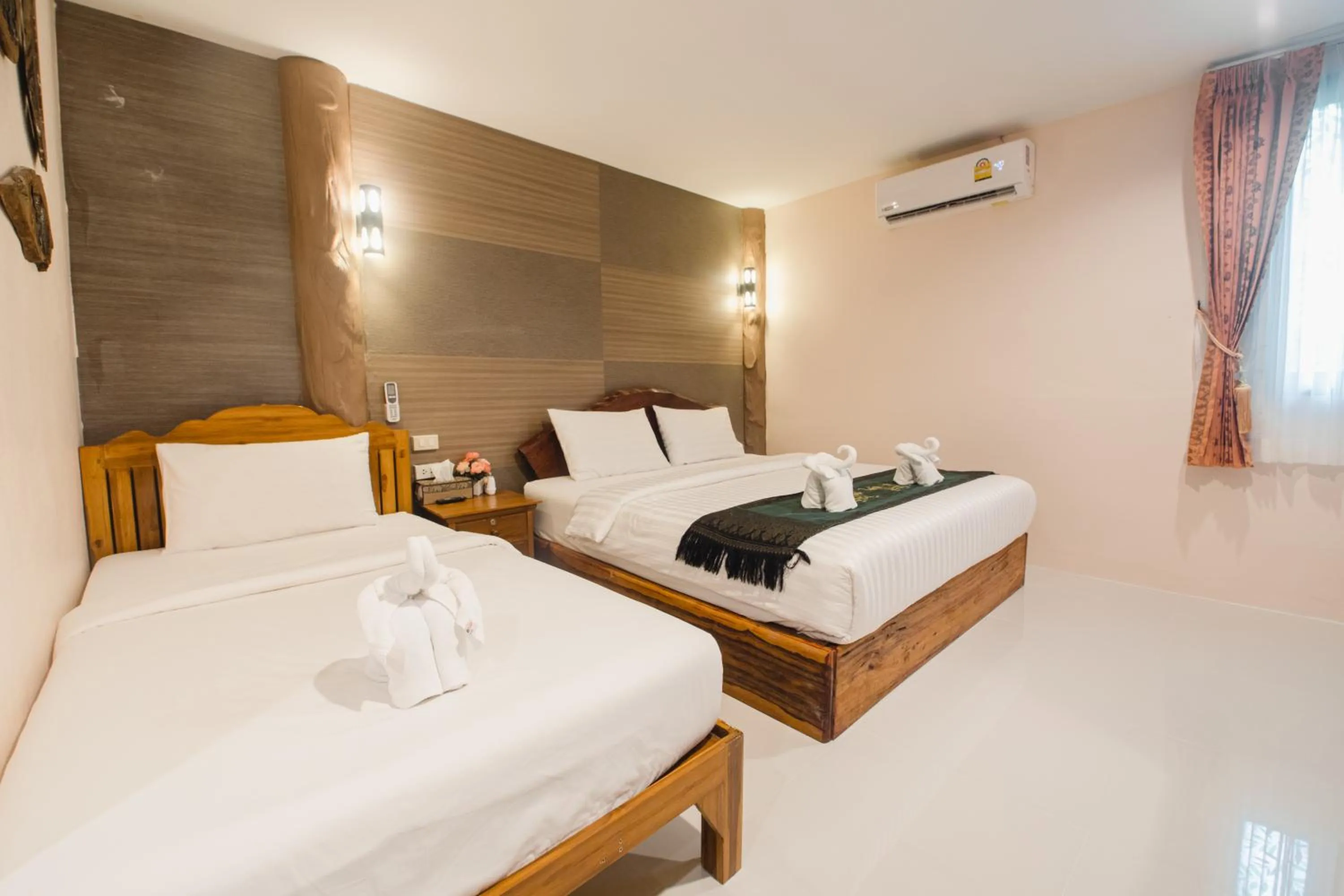 Bed in Naiyang Discovery Beach Resort SHA