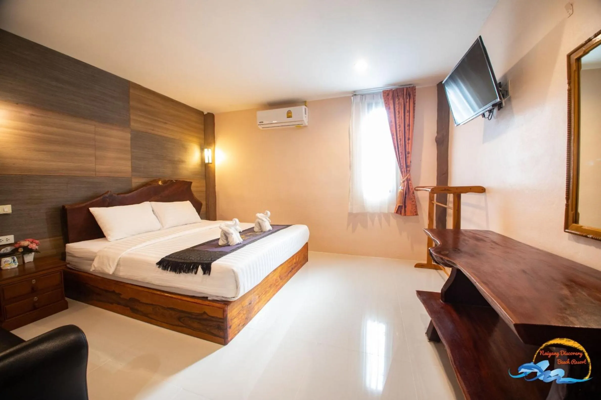 Photo of the whole room, Bed in Naiyang Discovery Beach Resort SHA