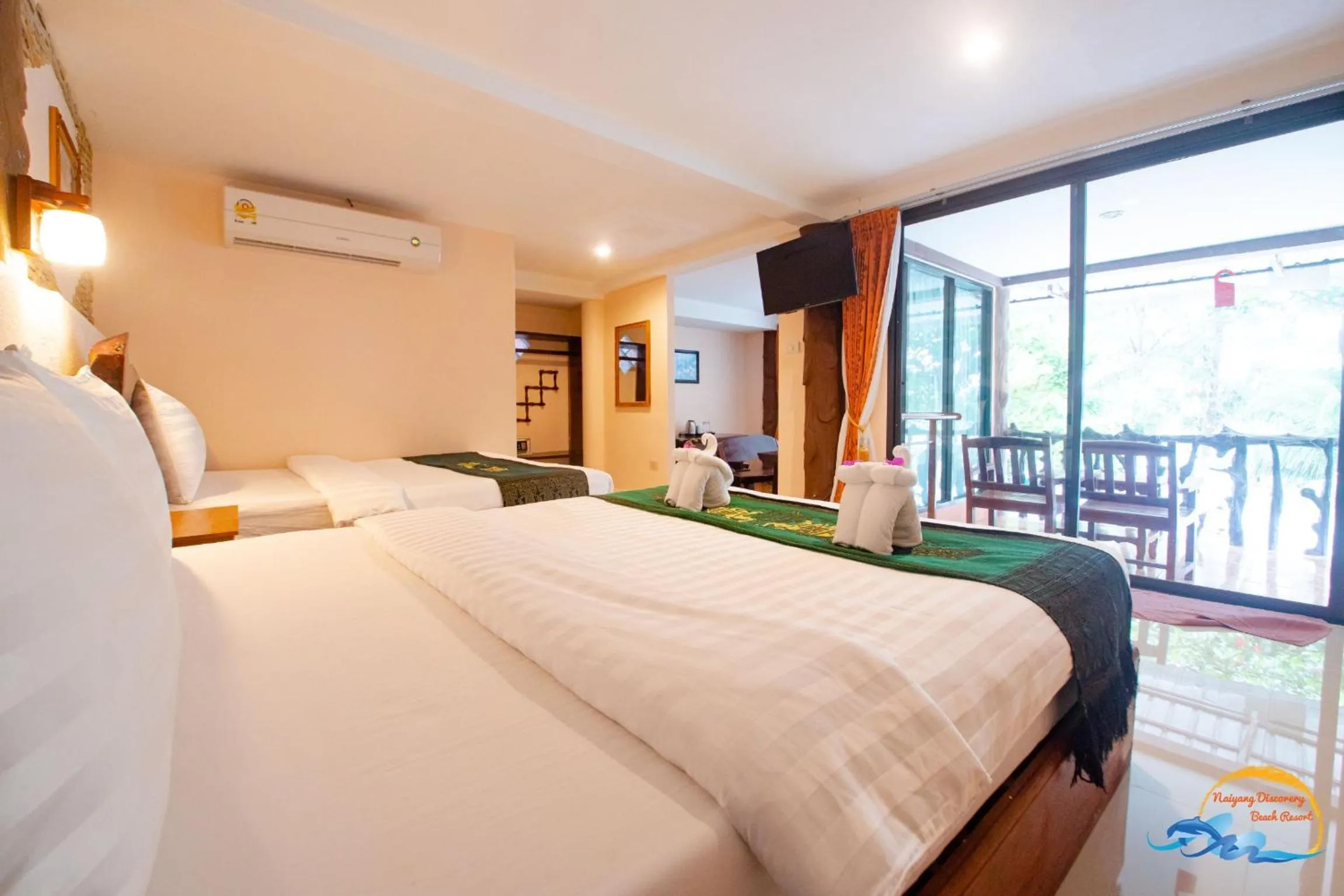 Photo of the whole room, Bed in Naiyang Discovery Beach Resort SHA