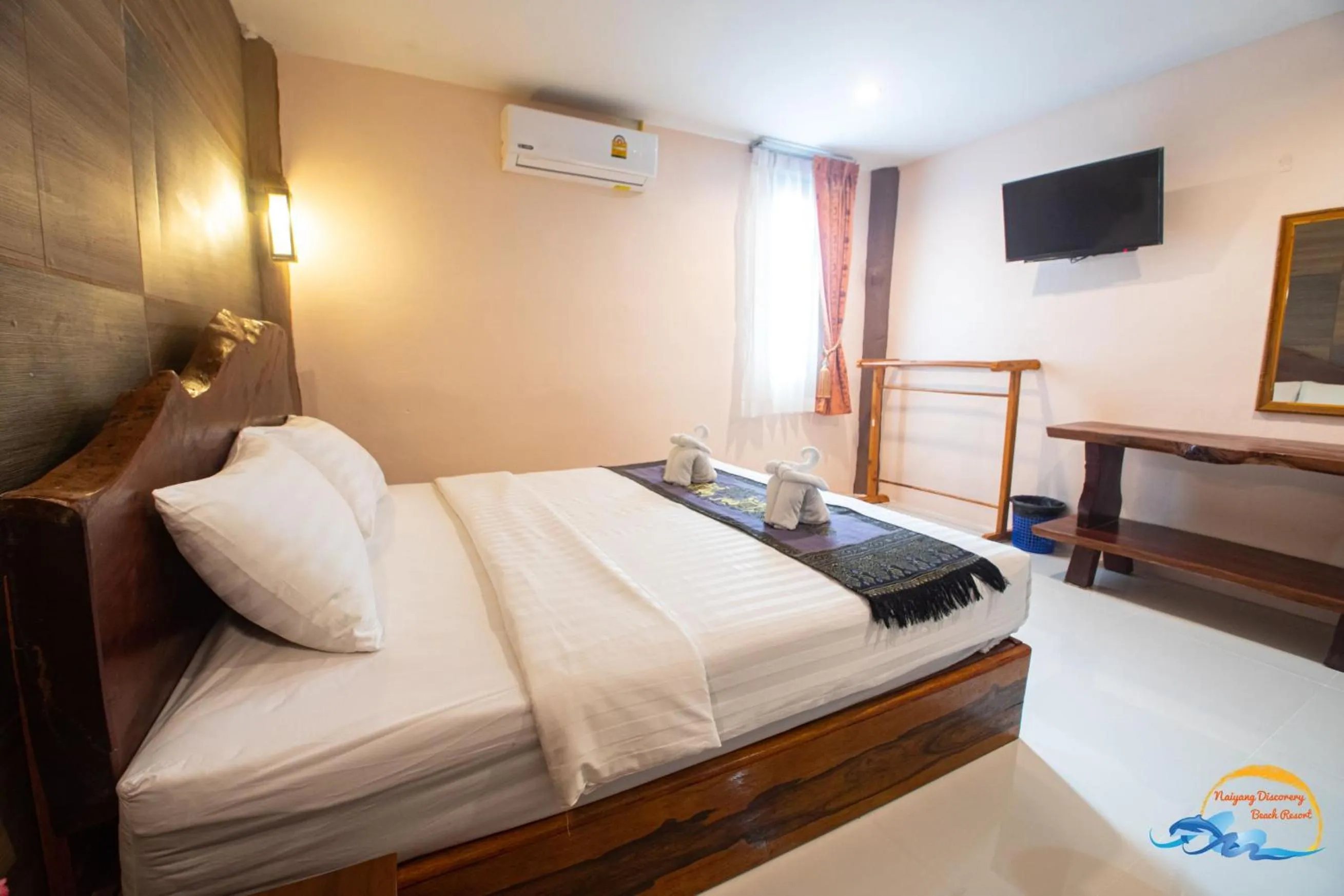 Photo of the whole room, Bed in Naiyang Discovery Beach Resort SHA