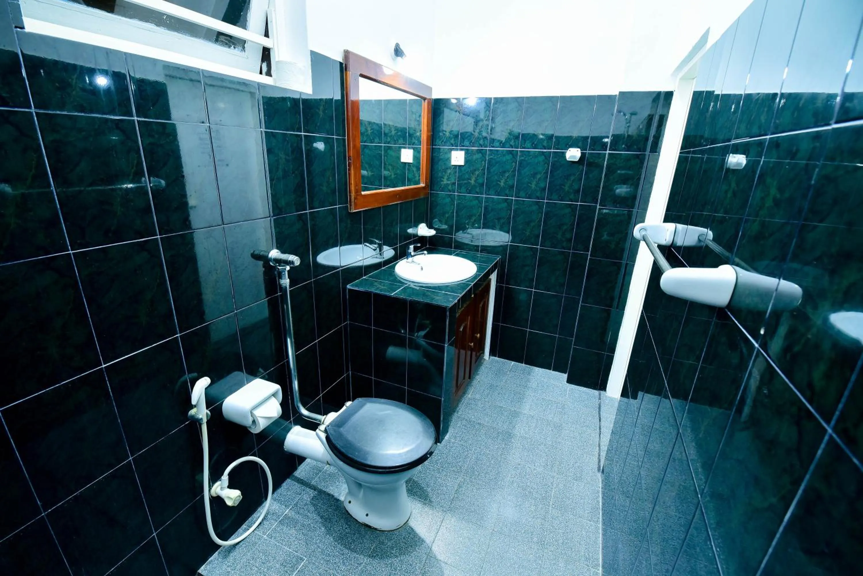 Toilet in International Beach Hotel & Restaurant